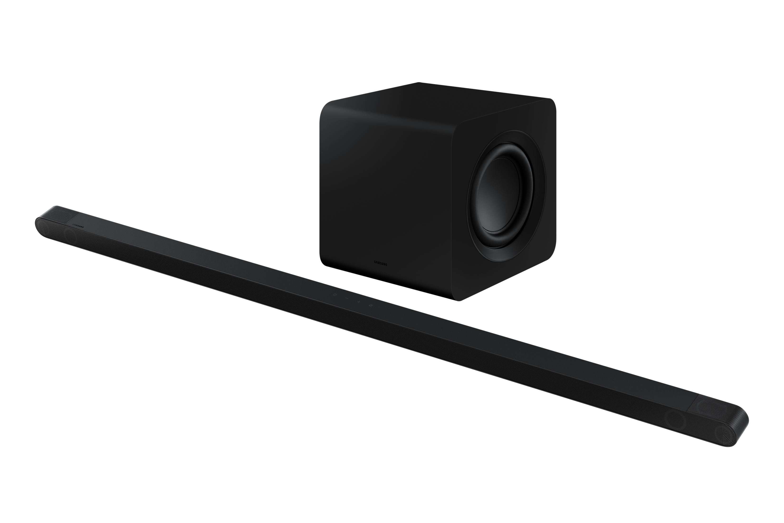 Barra de sonido y subwoofer negros sobre fondo blanco.