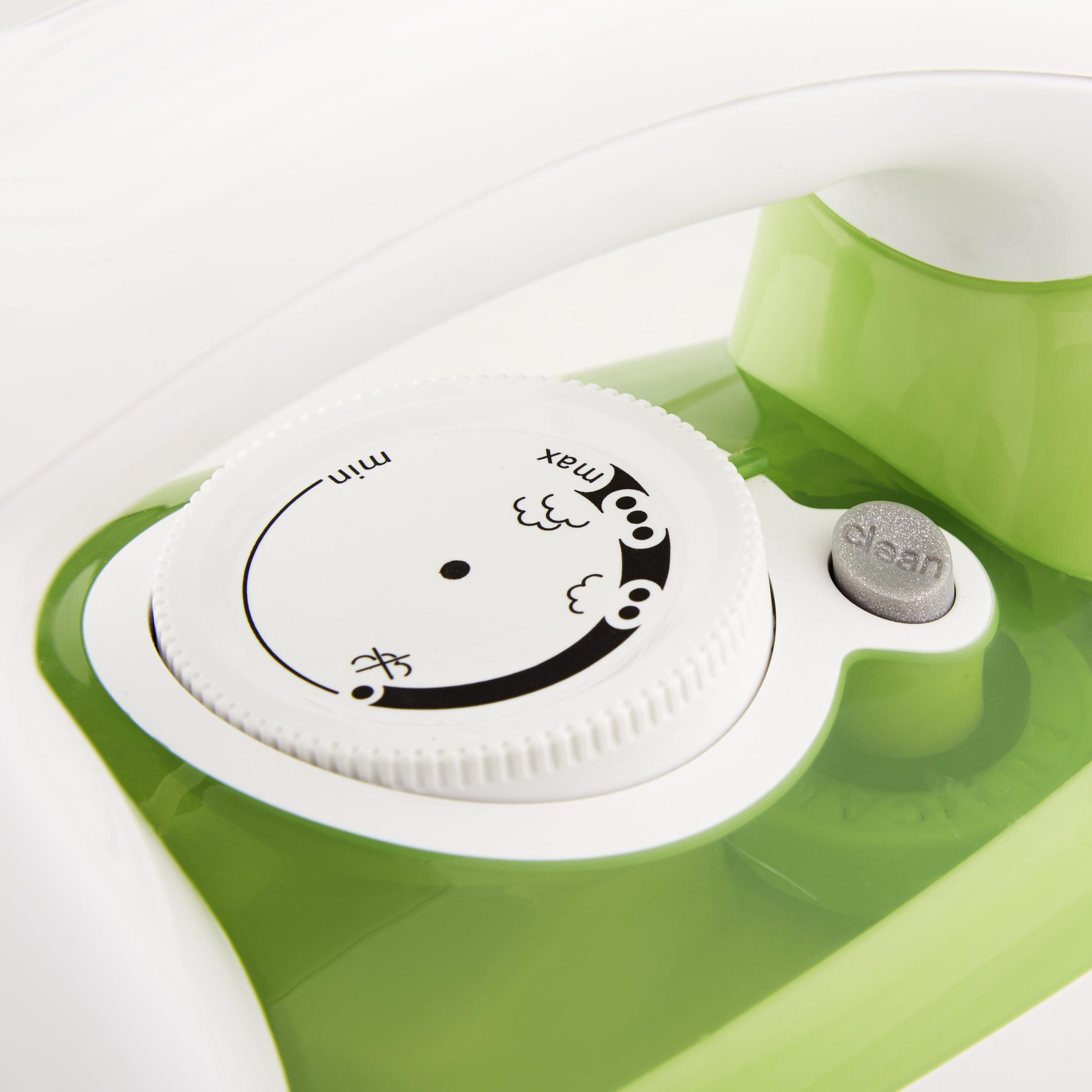 Primer plano de un dial blanco con marcas de mínimo y máximo, y base verde.
