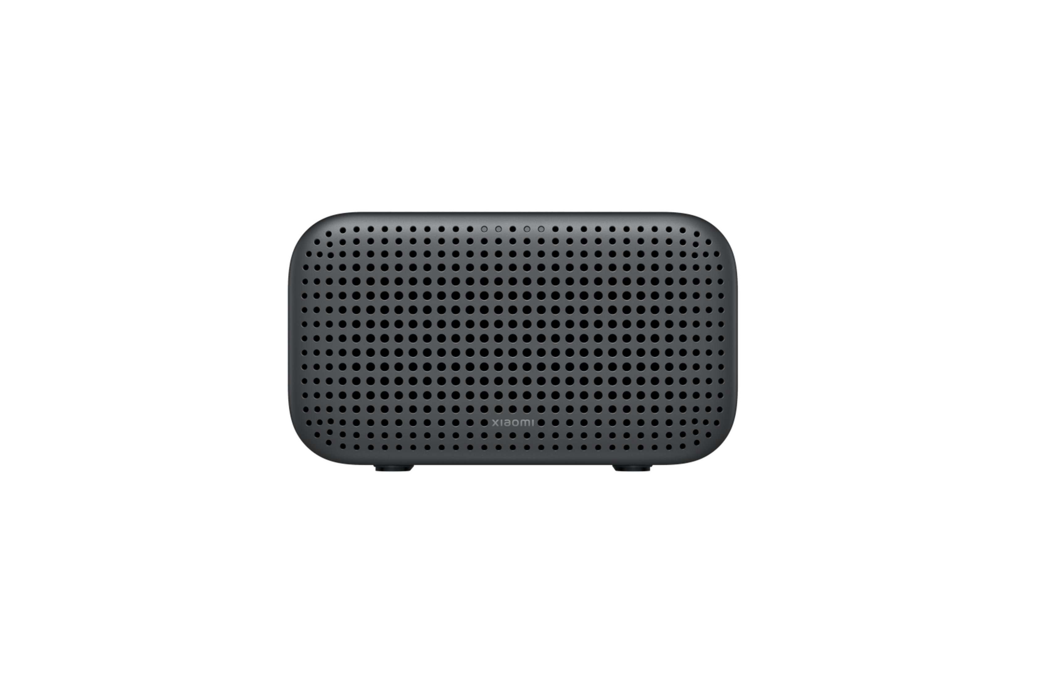 Altavoz gris con patrón de agujeros y logo de Xiaomi.