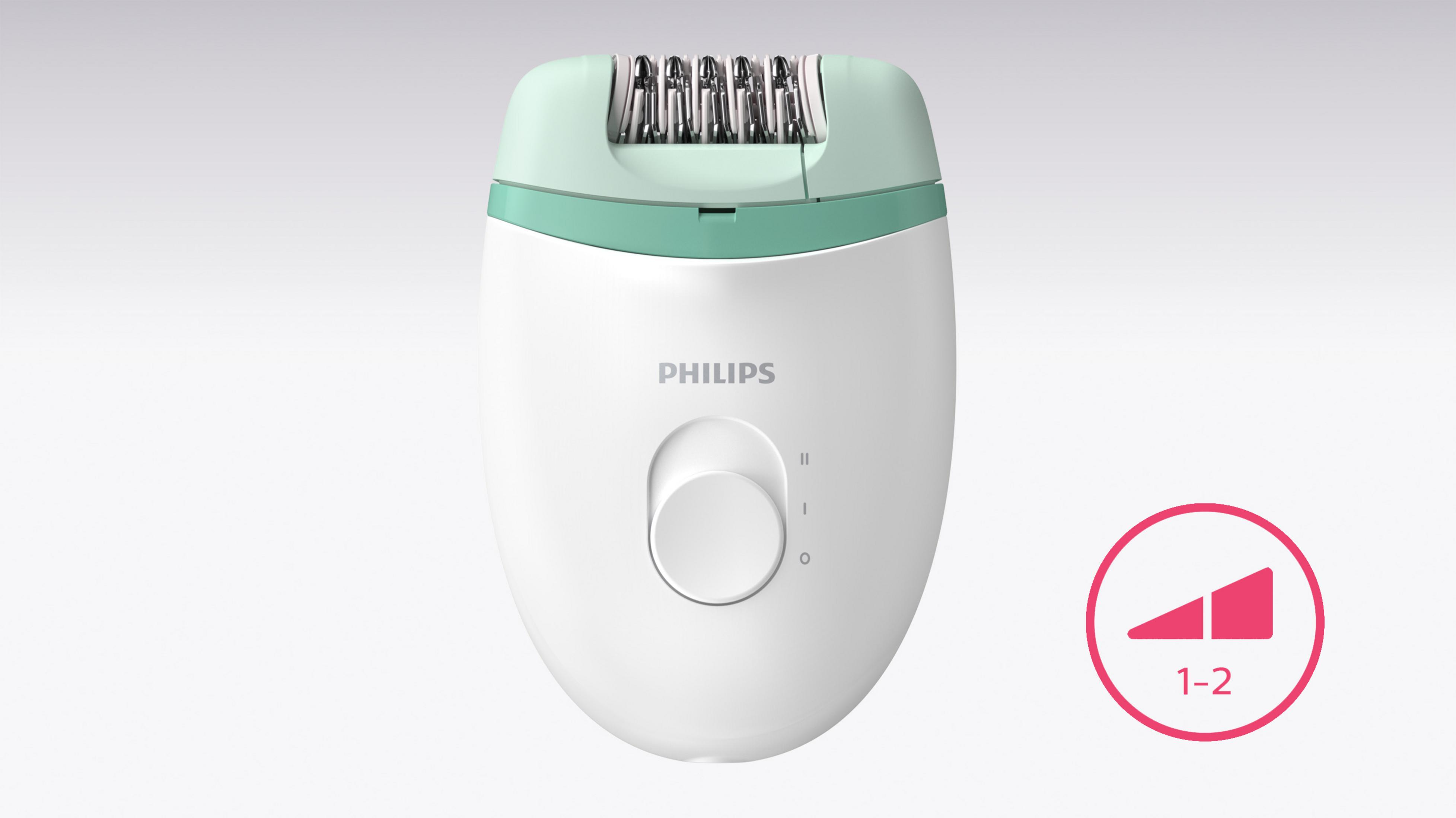 Una depiladora Philips blanca con detalles verde menta y un botón.