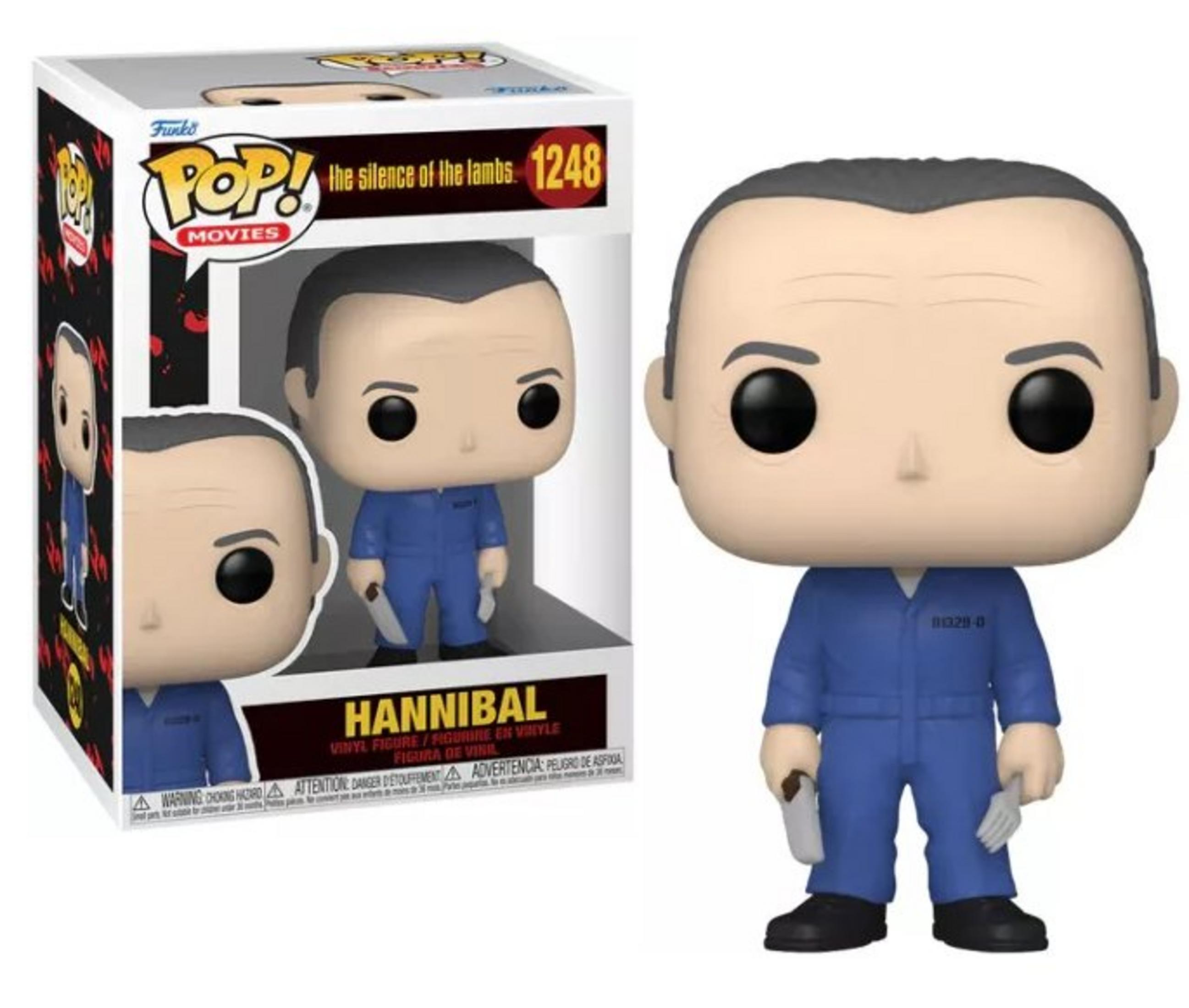 Action figure Funko Pop Hannibal in tuta blu con coltello e forchetta.