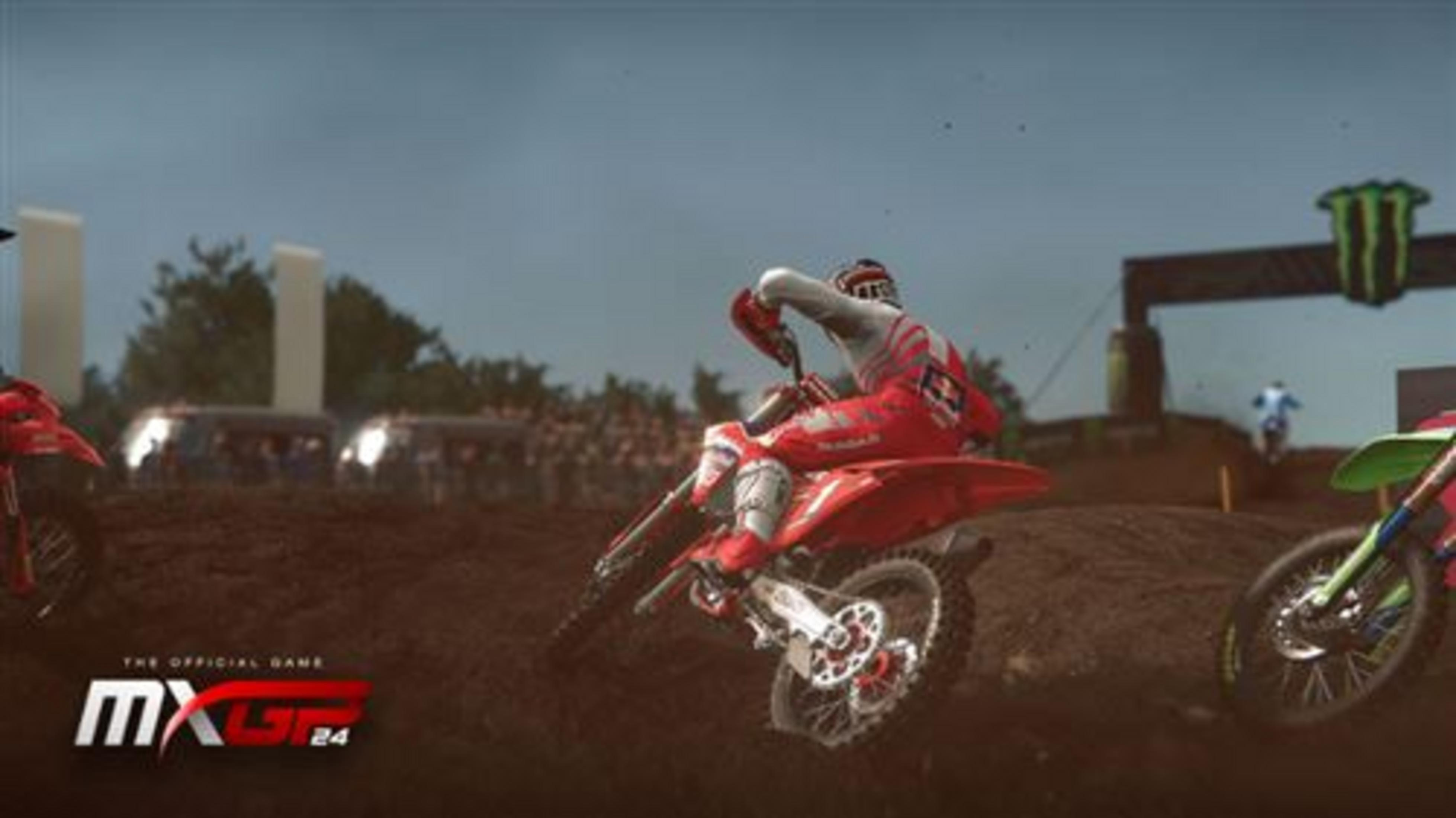 Piloti di motocross in tute rosse e verdi su pista sterrata. Logo MXGP 24.