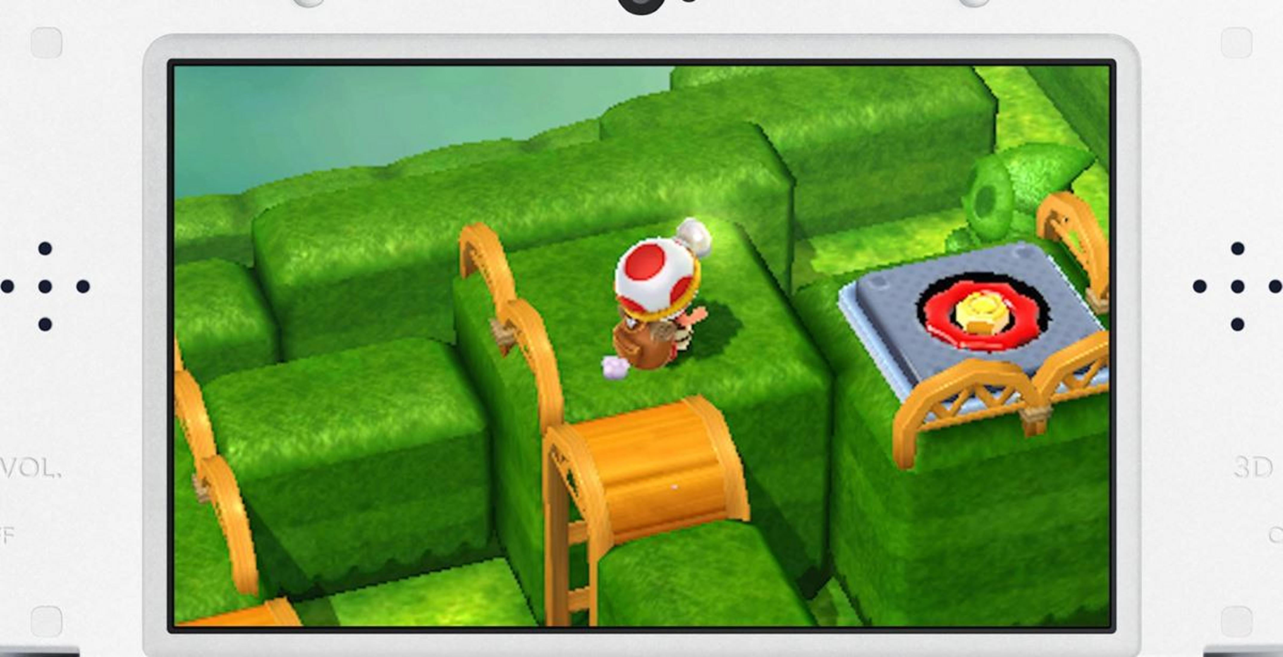 Un personaggio Toad si trova su un blocco d'erba verde vicino a un bersaglio rosso.