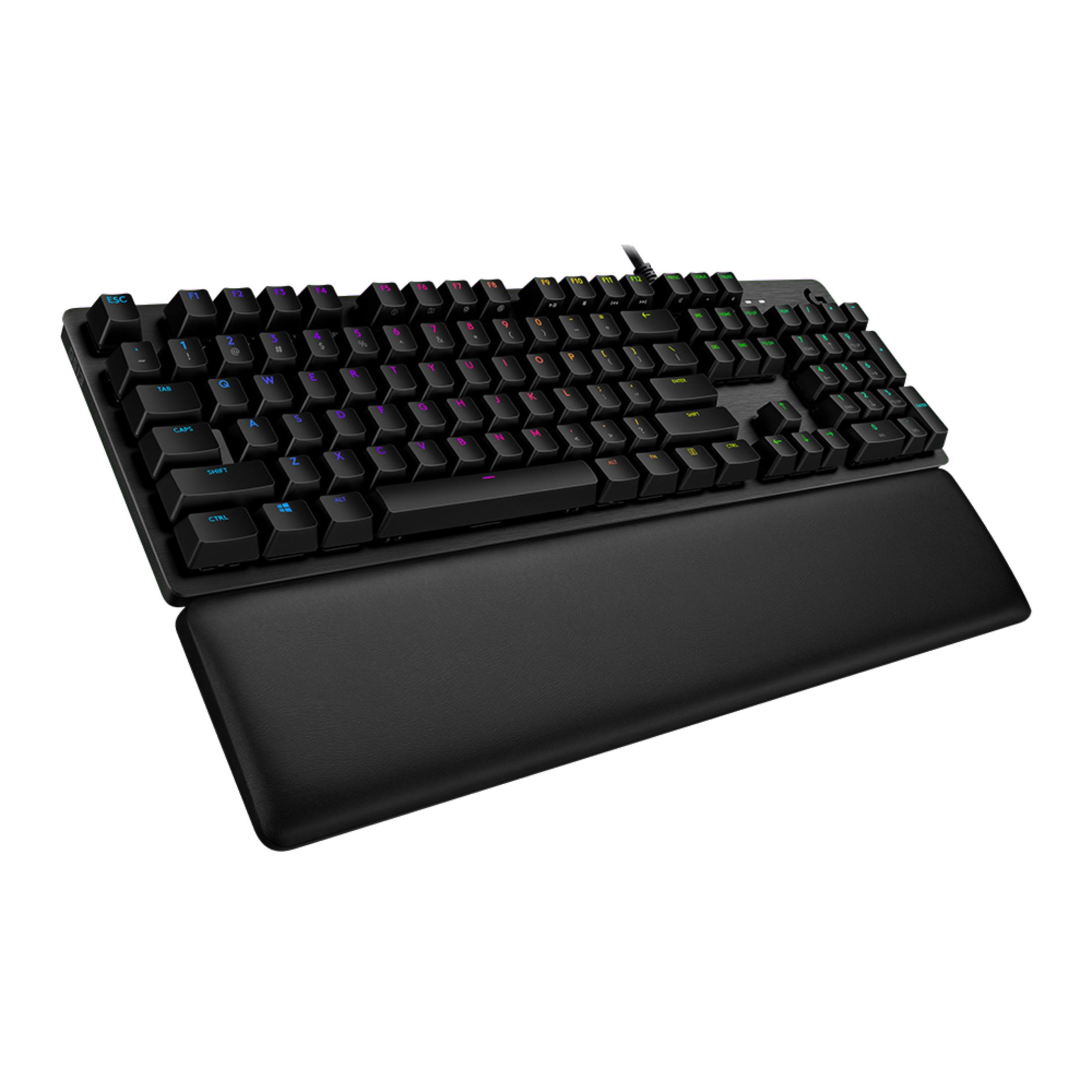 Teclado mecánico negro con iluminación RGB y reposamuñecas sobre fondo blanco.