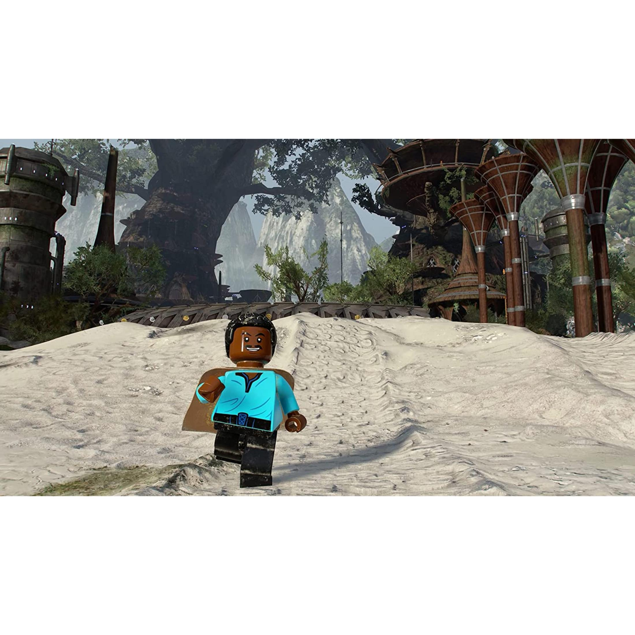 Un personaje de Lego con pelo castaño y camisa azul camina por una colina arenosa.