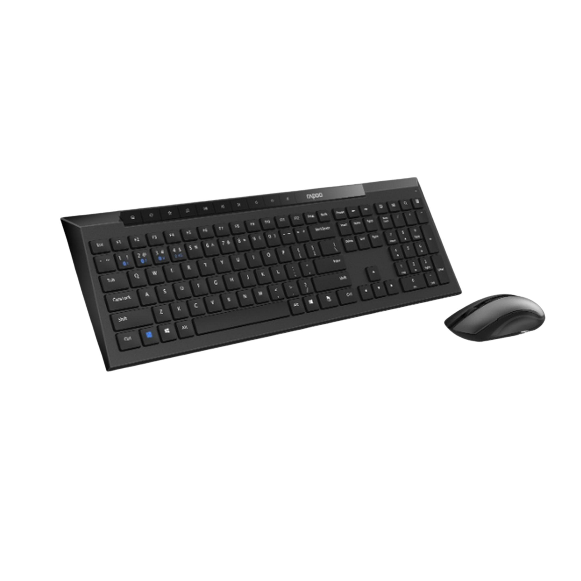 Teclado y ratón negros sobre fondo blanco.