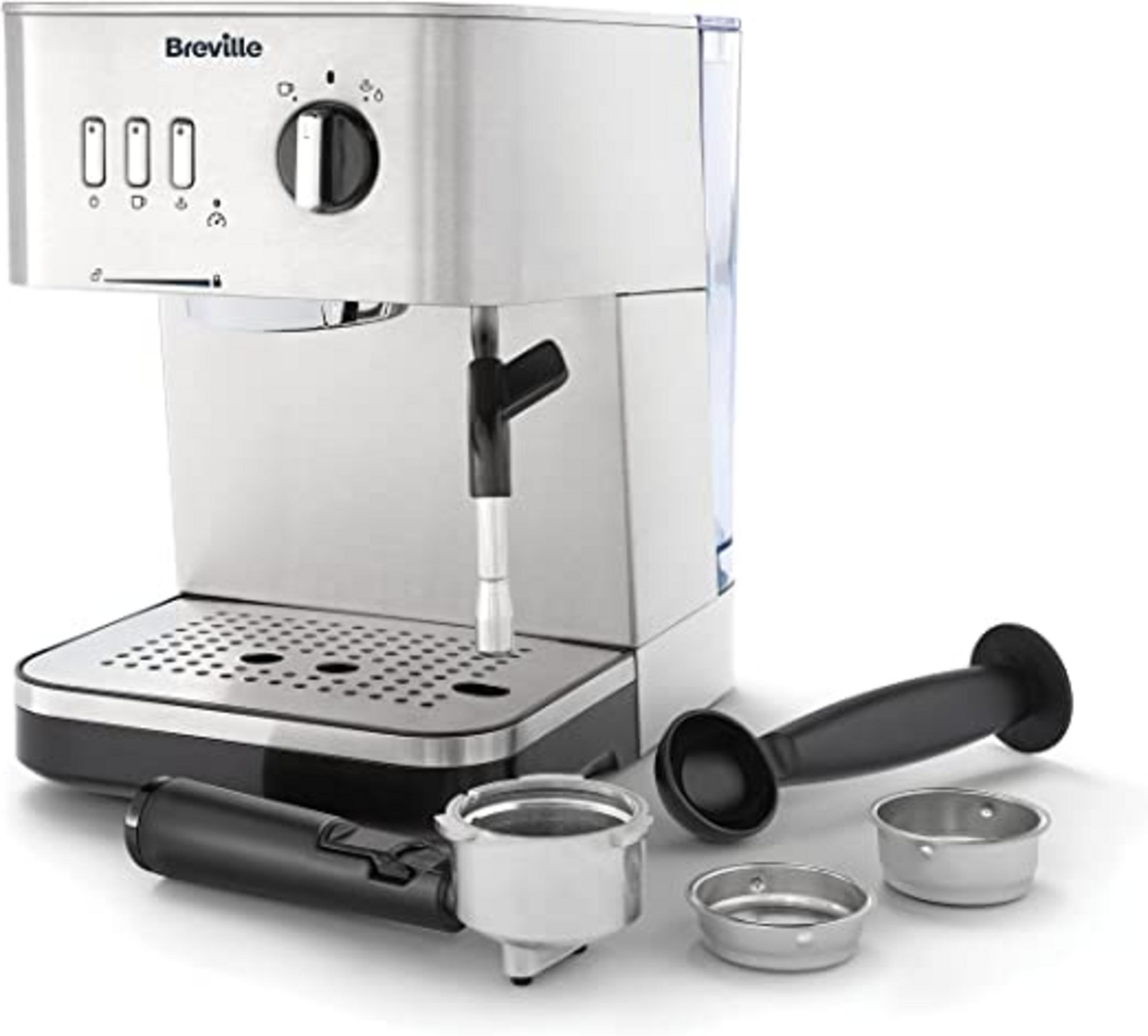 Máquina de espresso de acero inoxidable con portafiltro, cuchara y dos filtros.