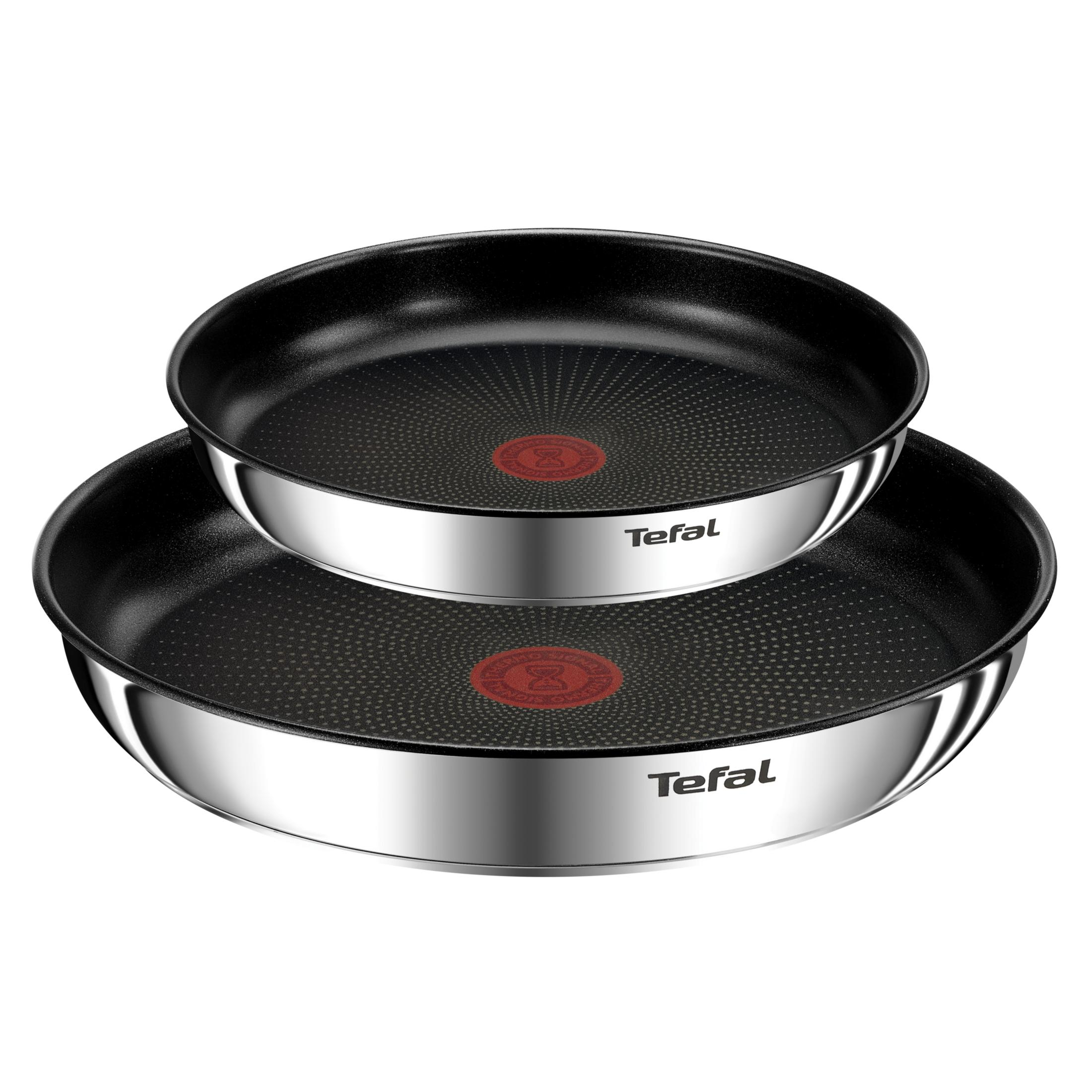 Dos sartenes Tefal, una más pequeña apilada sobre la otra, con puntos de cocción y termoseñal rojo.