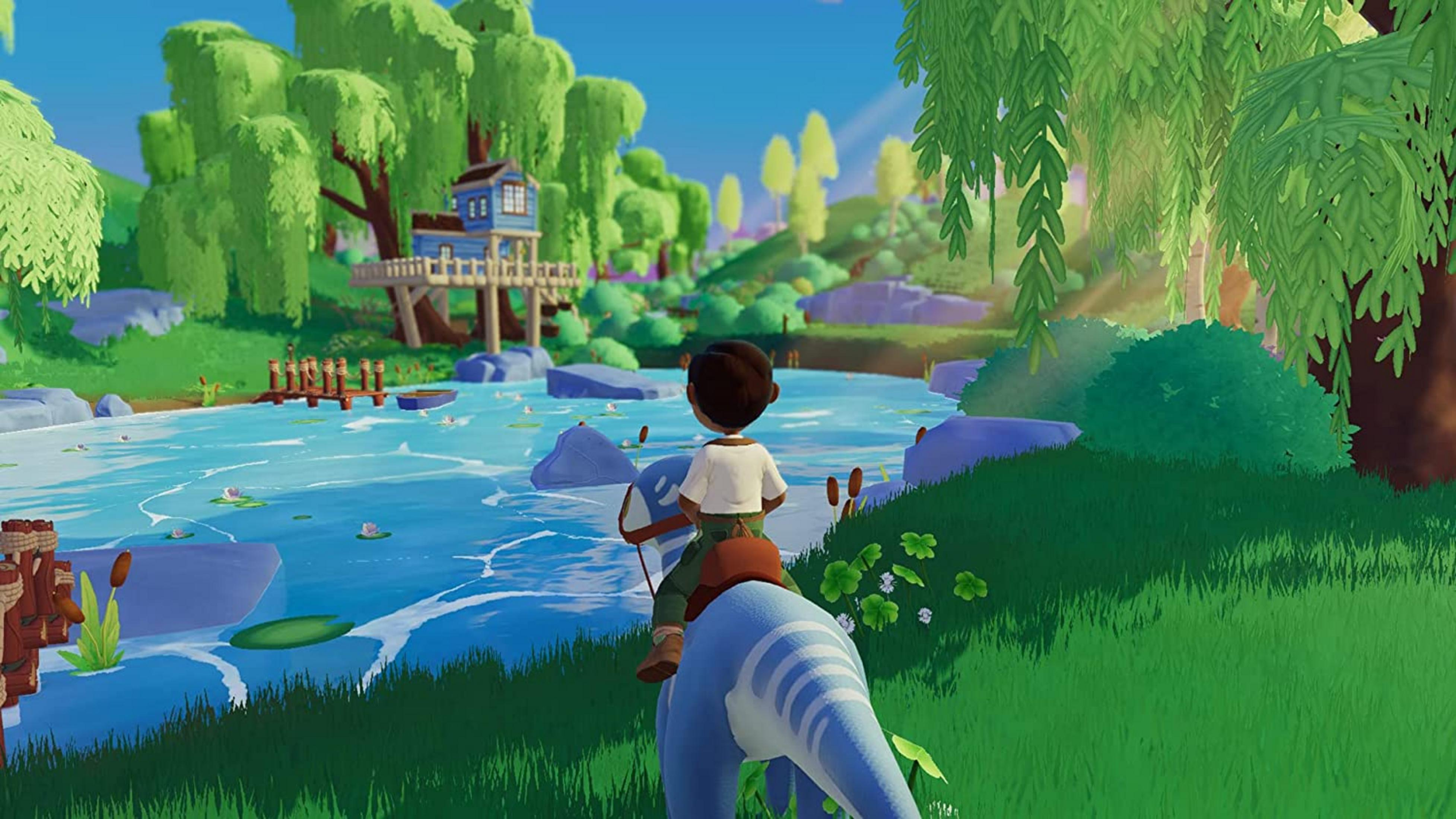 Un niño monta una criatura azul por un lago con nenúfares y una casa en un árbol.