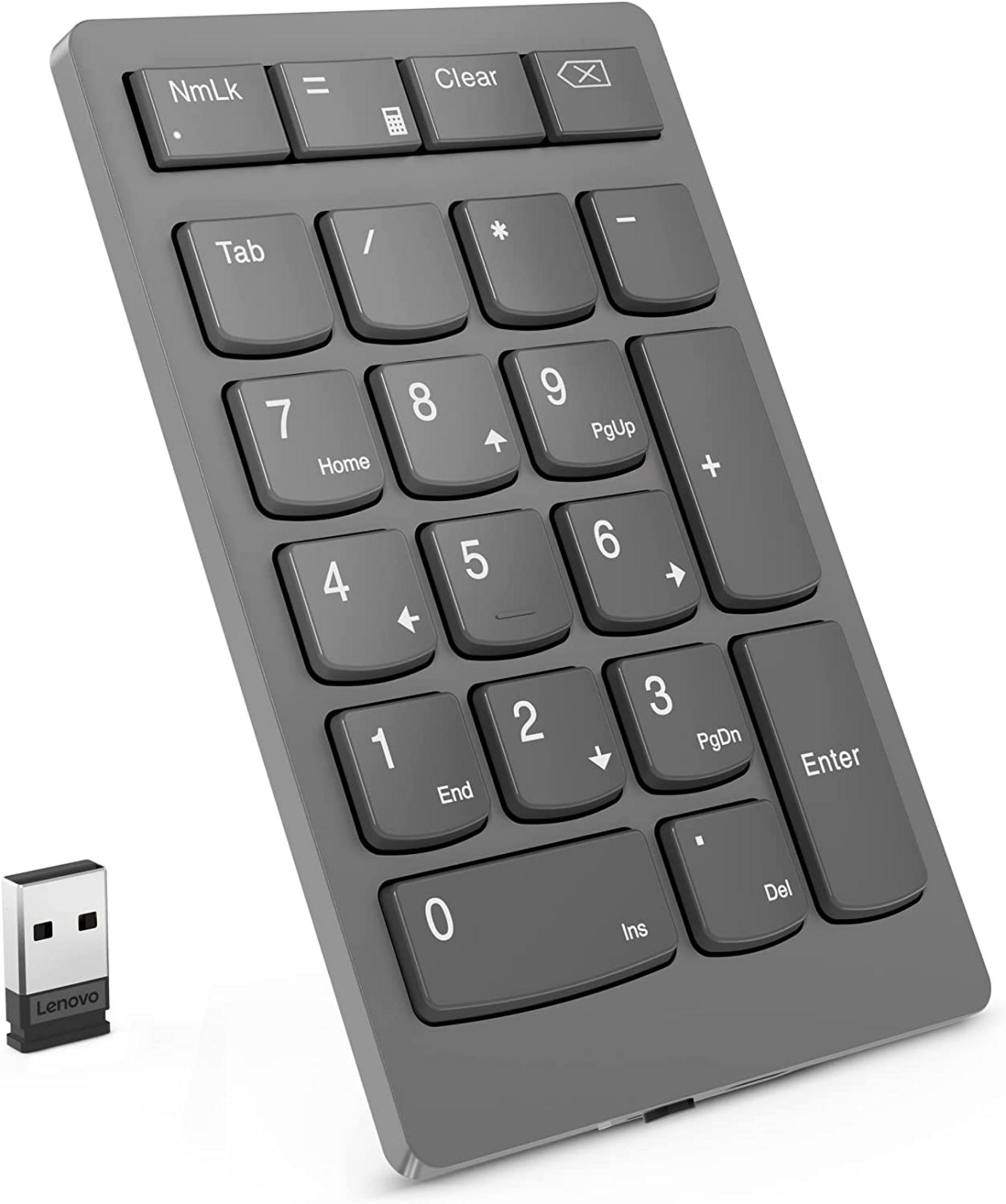 Se muestran un teclado inalámbrico Lenovo gris y un dongle USB sobre fondo blanco.