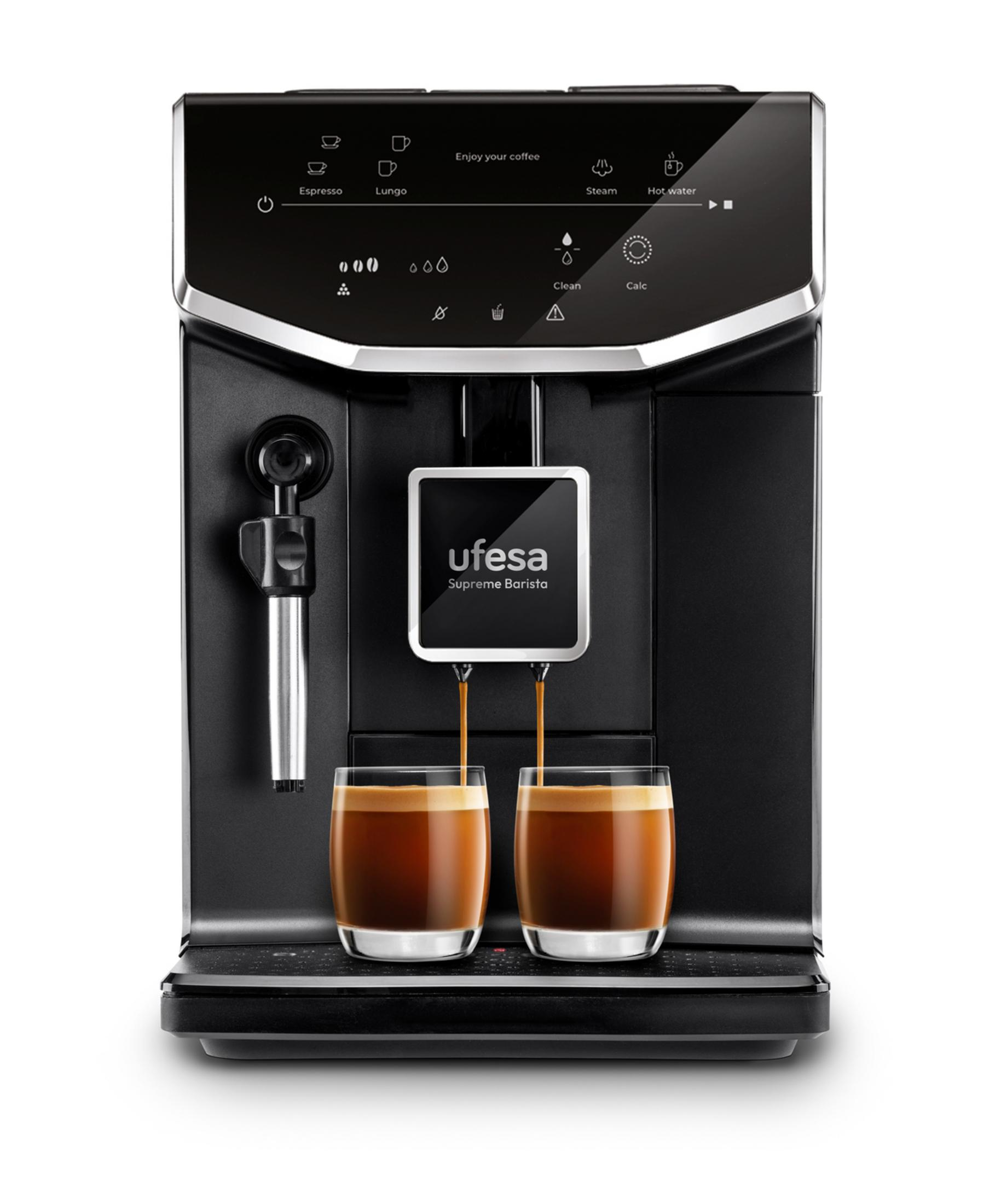 Una cafetera negra Ufesa Supreme Barista prepara dos espressos en vasos transparentes.