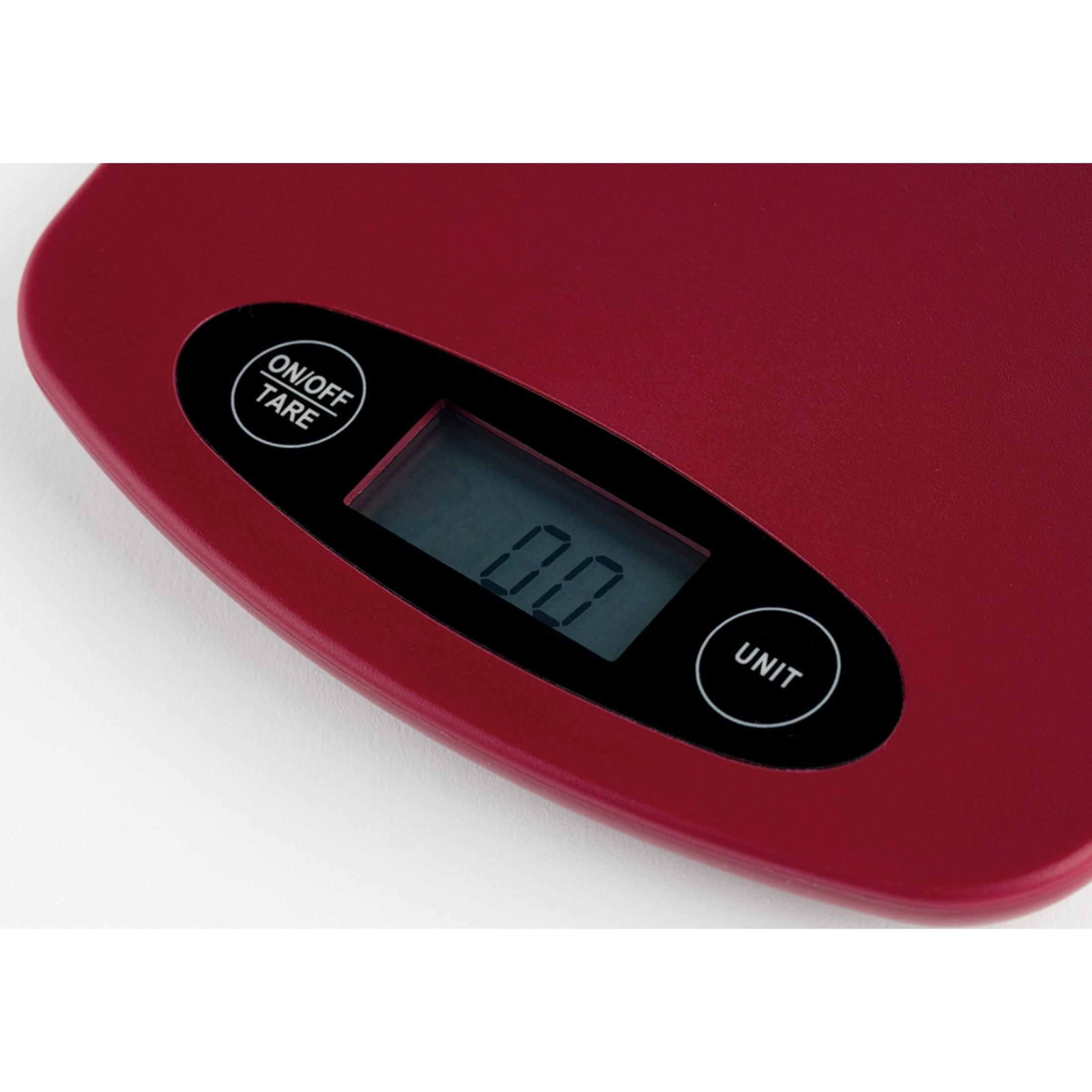 Una báscula de cocina digital roja con pantalla negra que muestra 0,0.