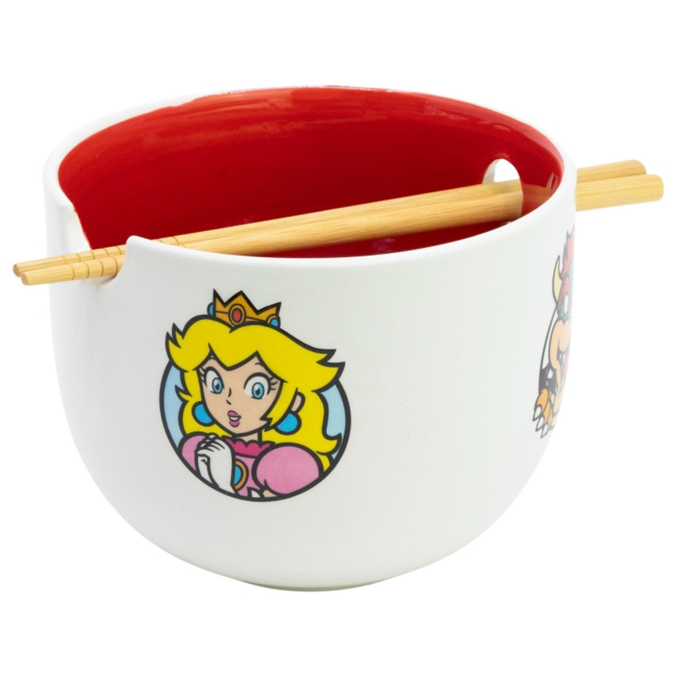 Cuenco blanco con interior rojo, con gráficos de la Princesa Peach y Bowser, con palillos.