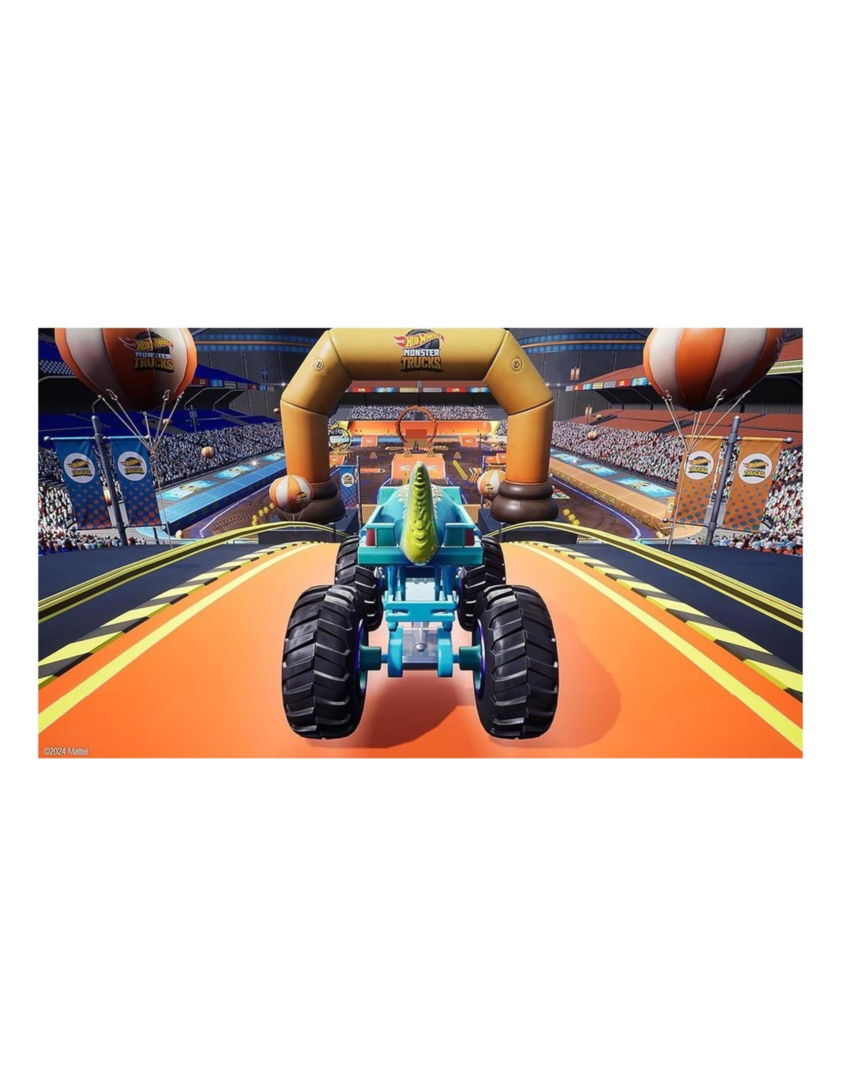 Un monster truck giocattolo blu con corno su una pista da corsa davanti a uno stadio.