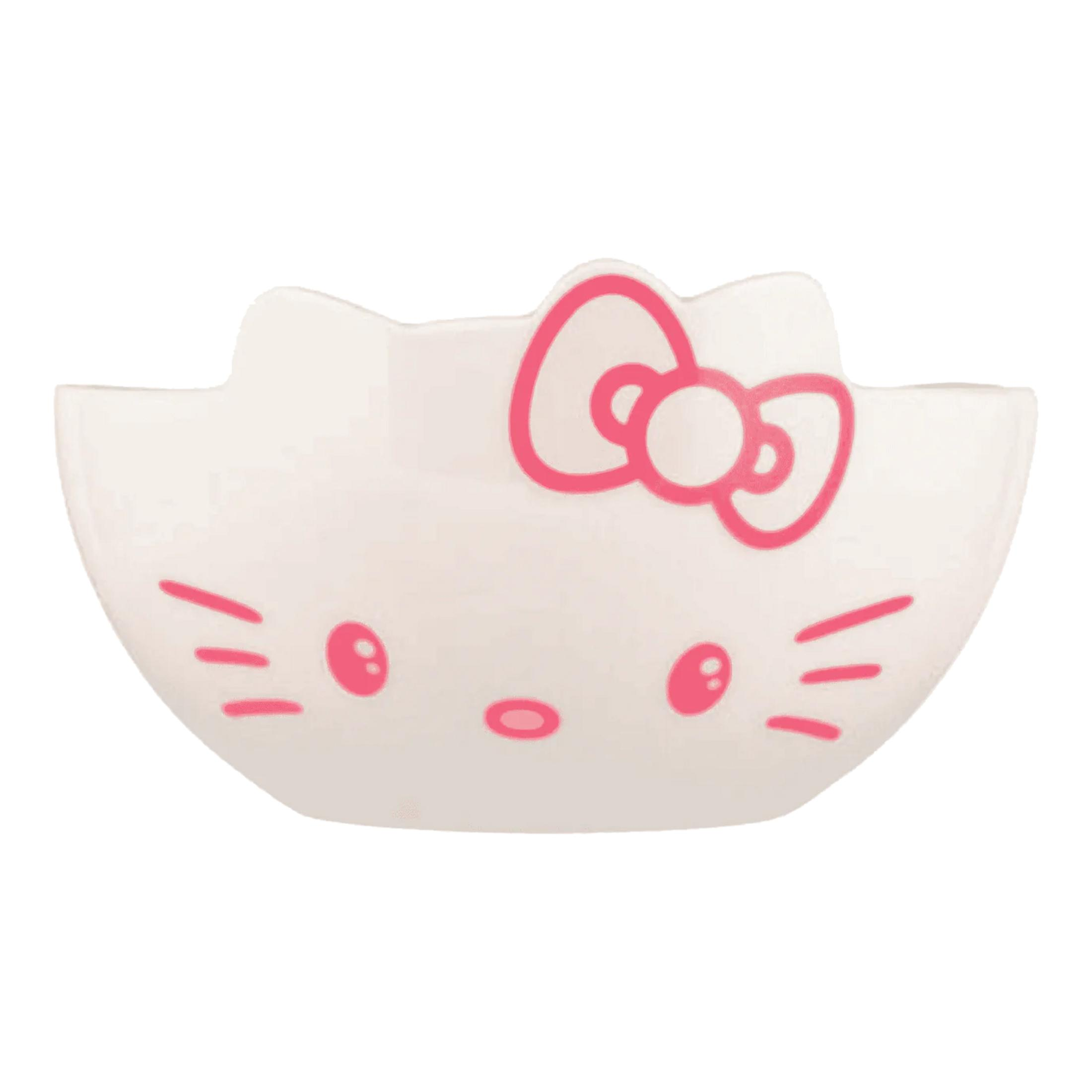 Eine weiße Schale mit rosa Hello Kitty Gesicht und Schleife.