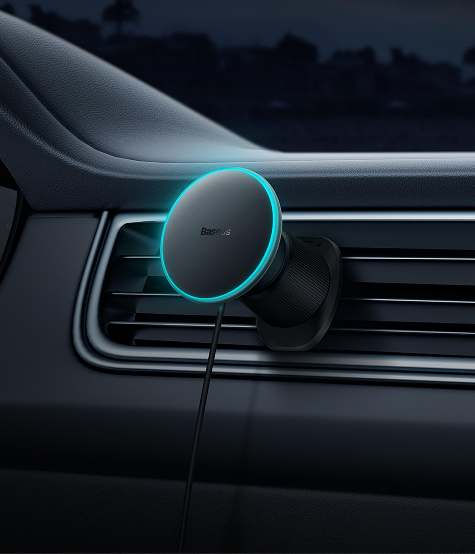 Ein schwarzer Lüftungsschlitz-Handyhalter mit blauem Licht in einem Auto.