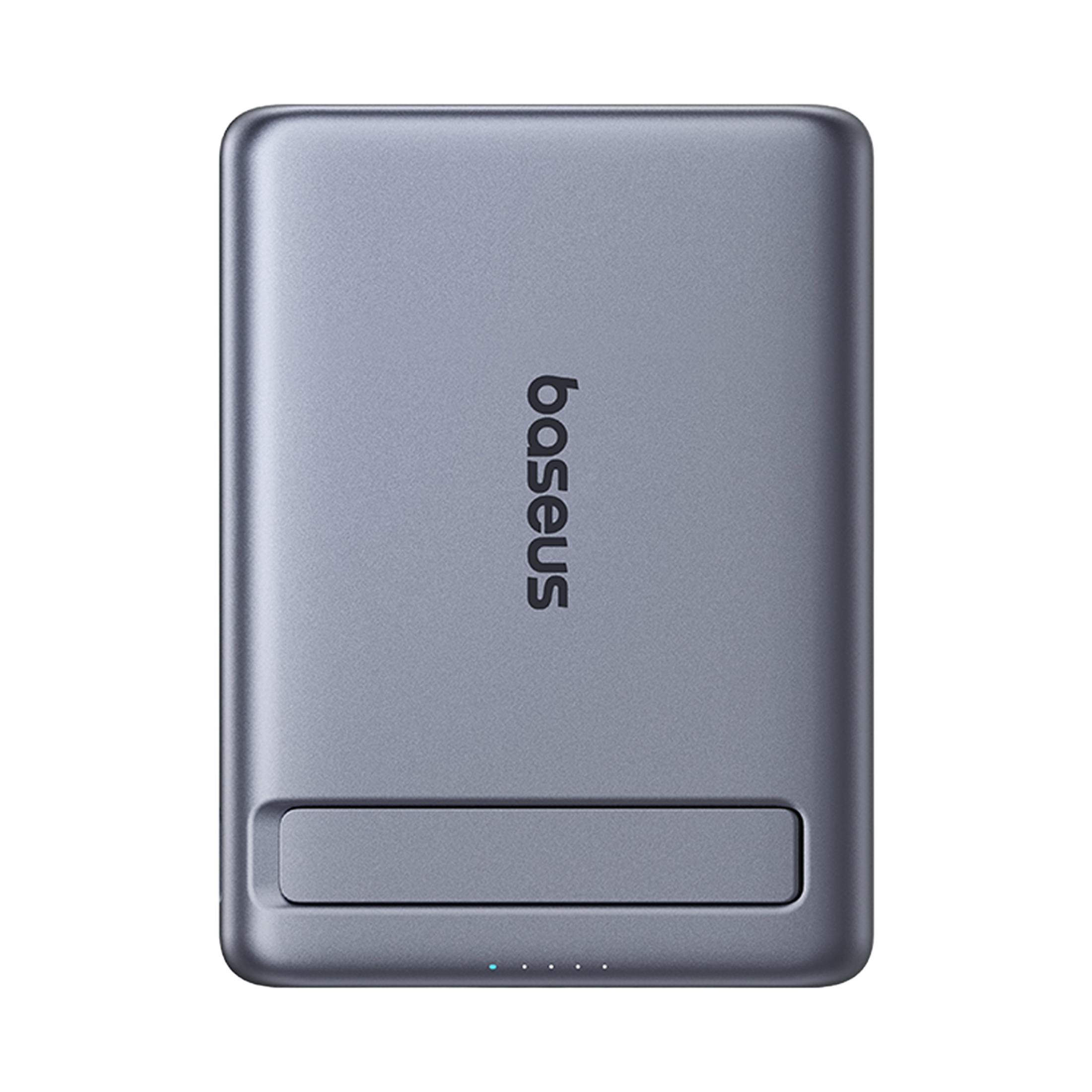 Batería externa Baseus gris con indicador de carga y enchufe retráctil.