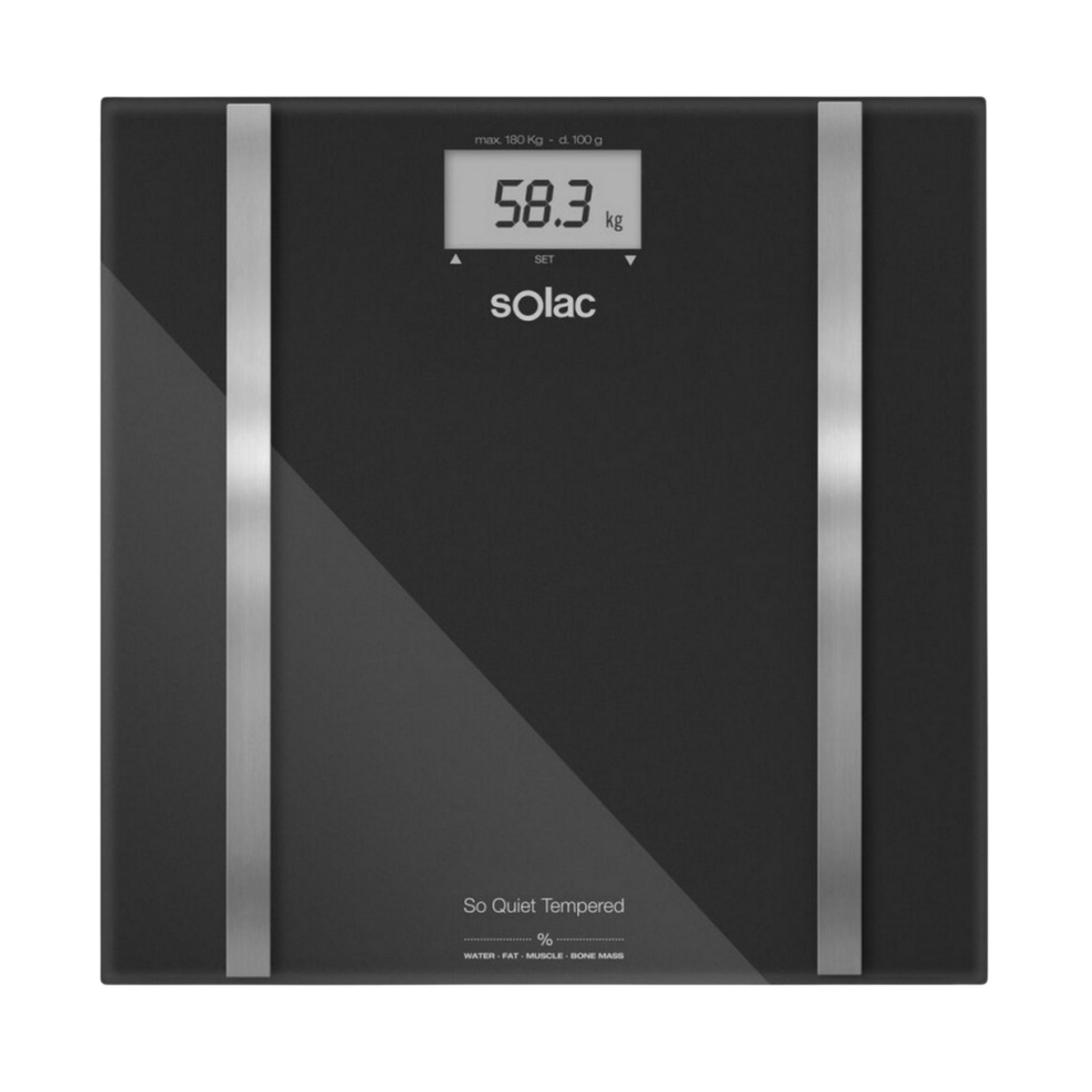 Una bilancia digitale nera mostra 58,3 kg. Max 180 Kg.