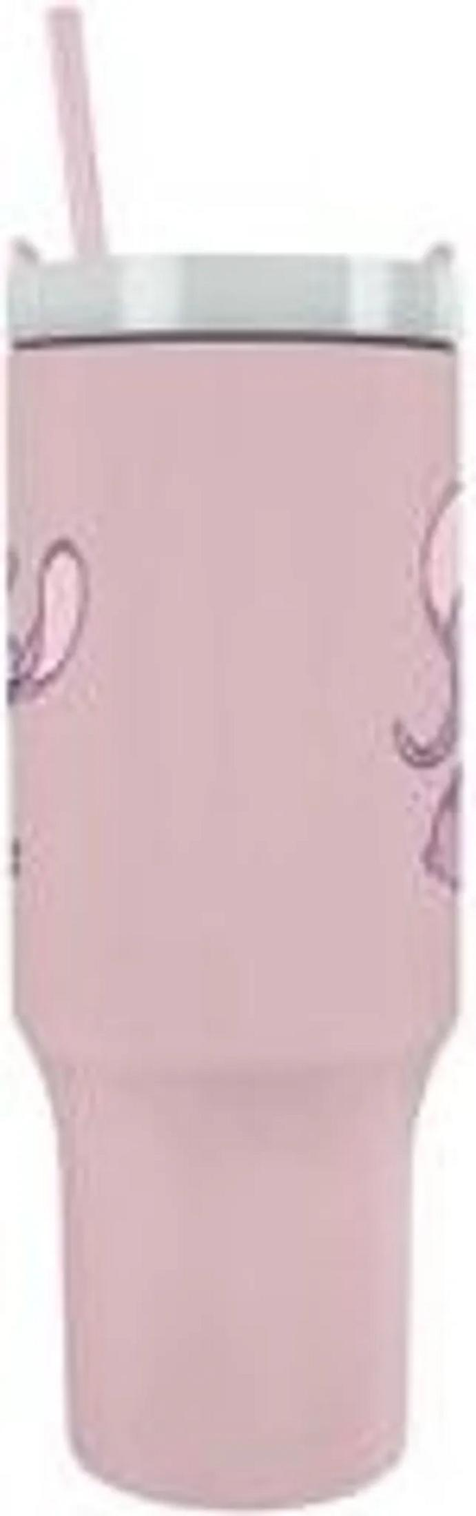 Un vaso rosa con pajita rosa y diseños morados.