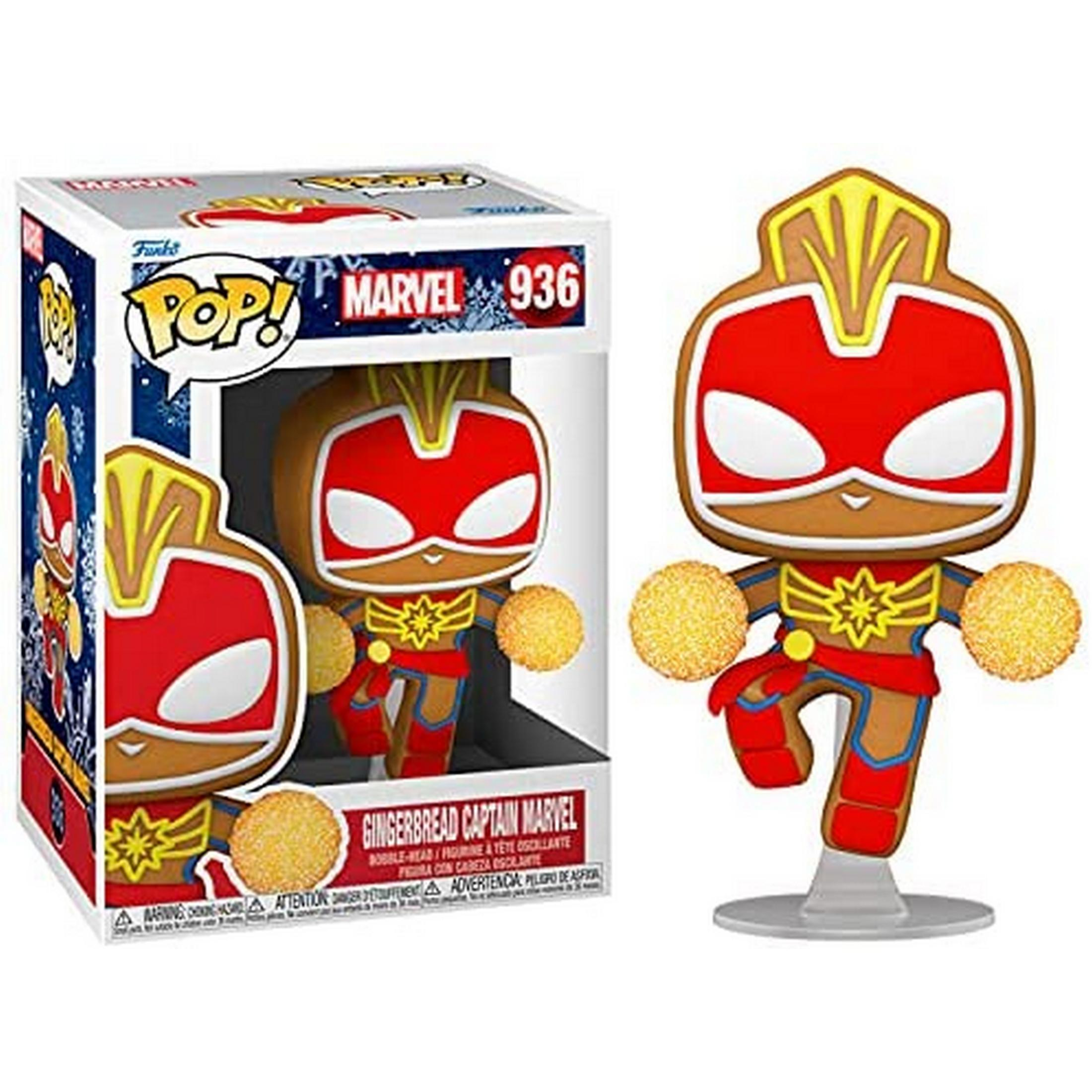Una figuretta Funko Pop! Captain Marvel in pan di zenzero, rossa, marrone e gialla, con due sfere.