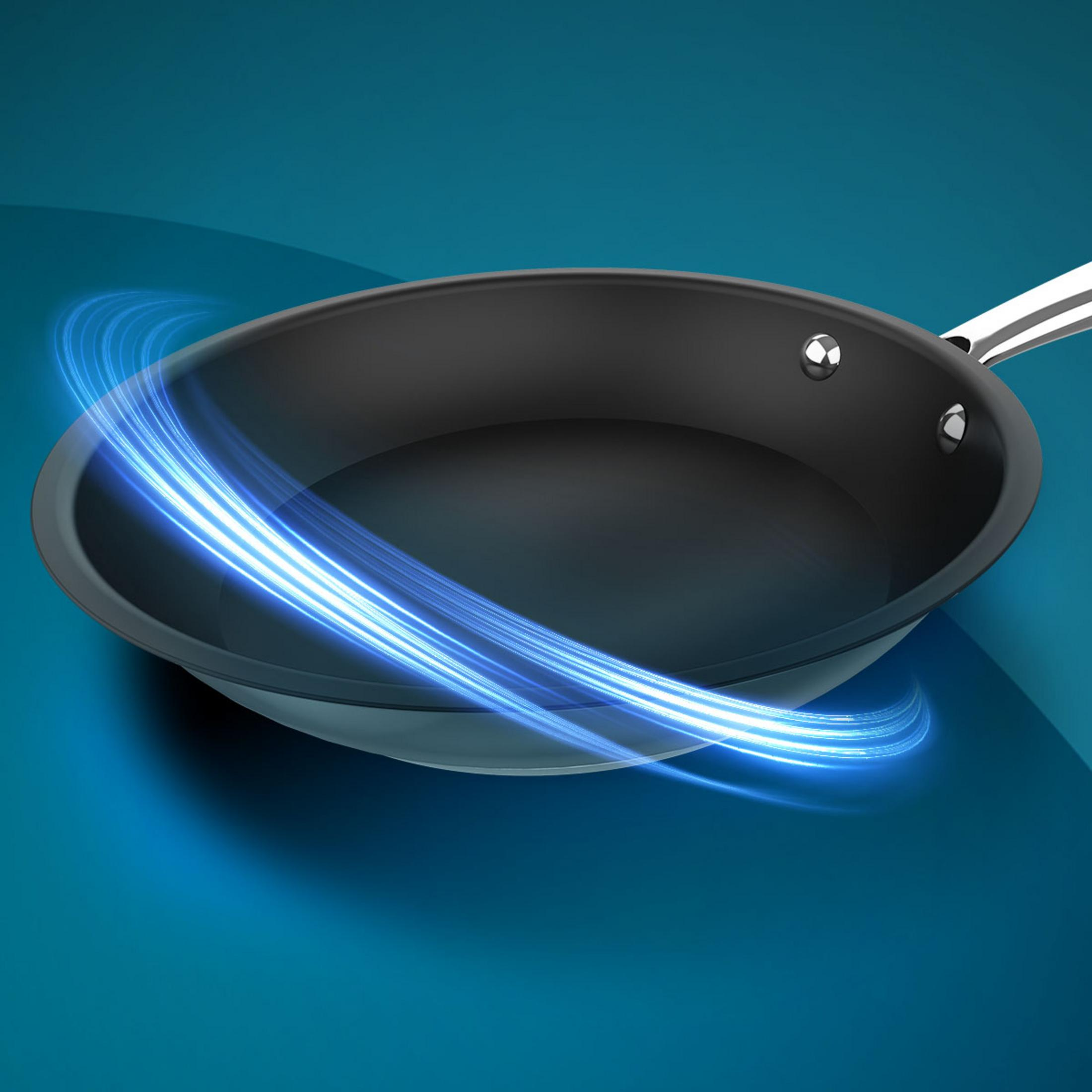 A black frying pan with blue light streaks swirling around it.