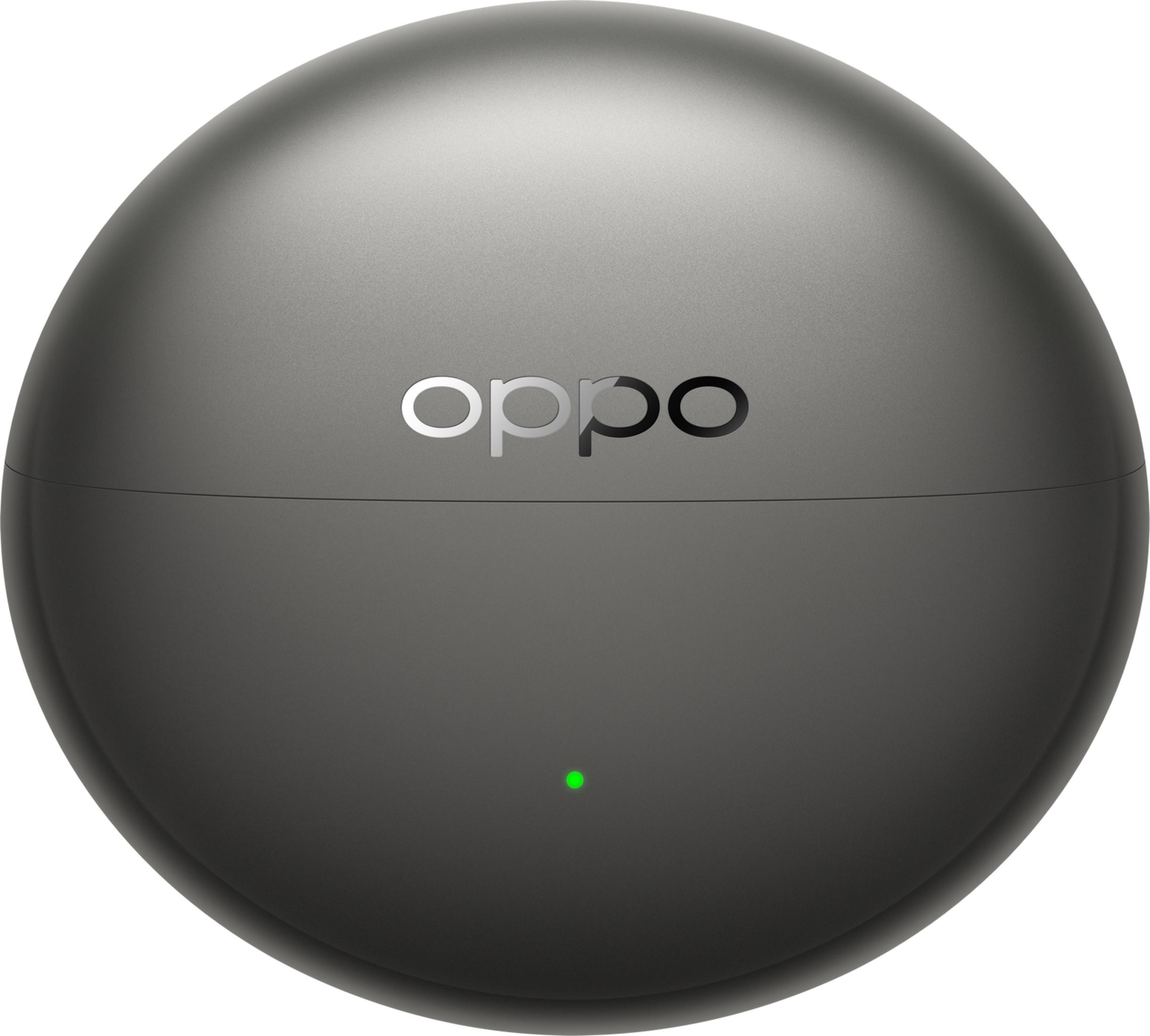Custodia di ricarica rotonda grigia con logo OPPO e luce verde.