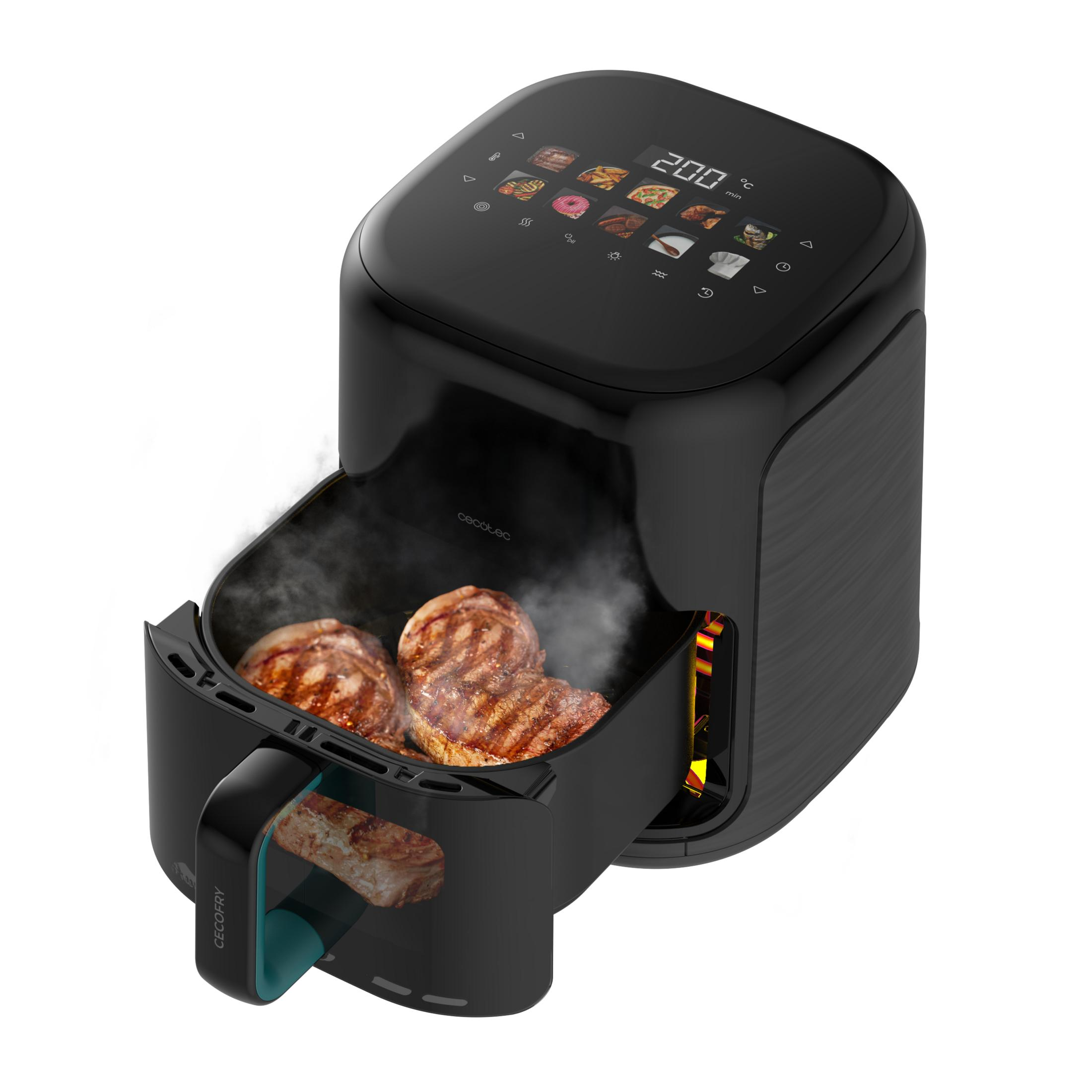 Friggitrice ad aria nera con bistecche nel cestello e display digitale.