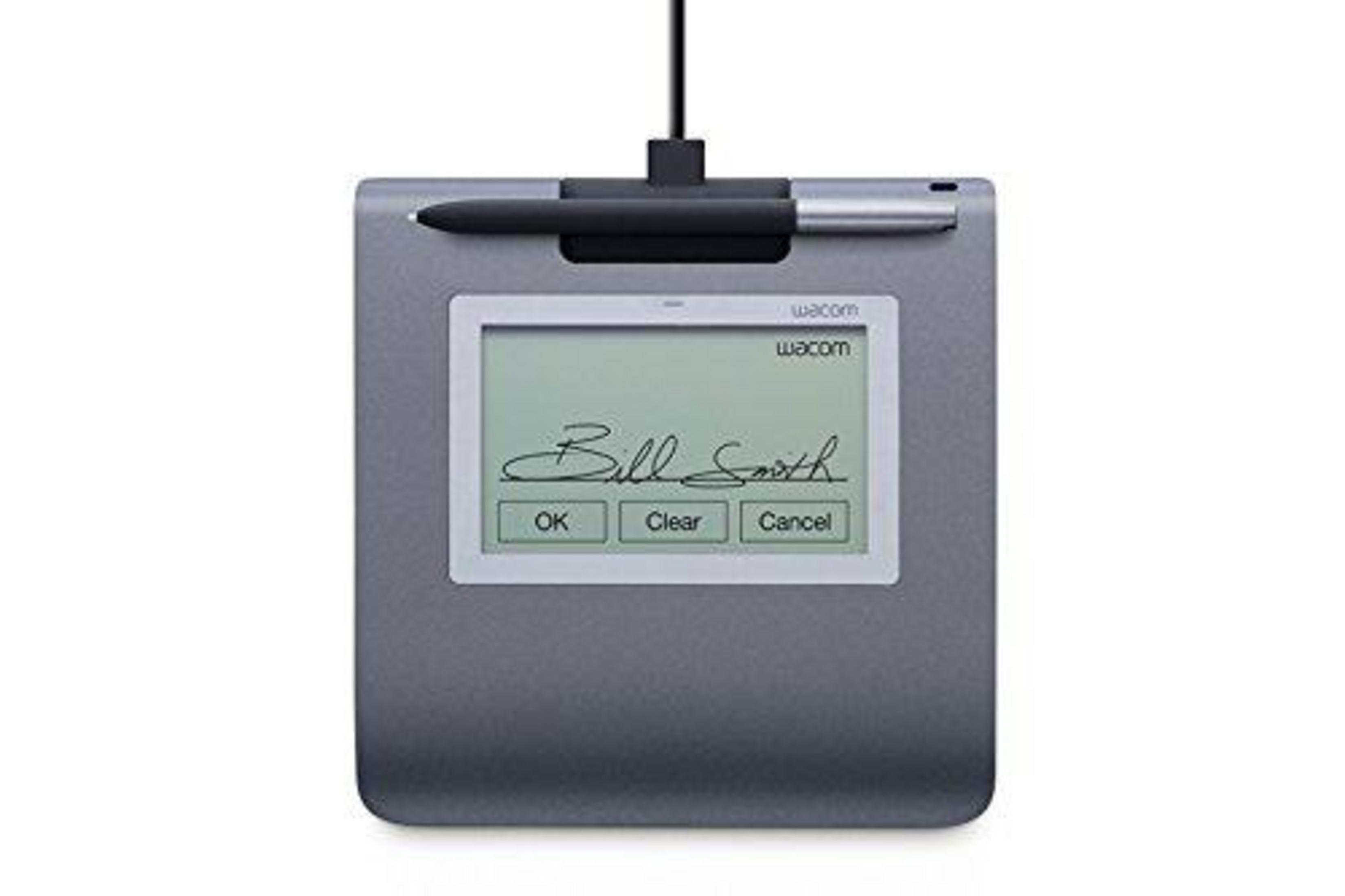 Una tableta de firma Wacom gris con lápiz, mostrando una firma digital.