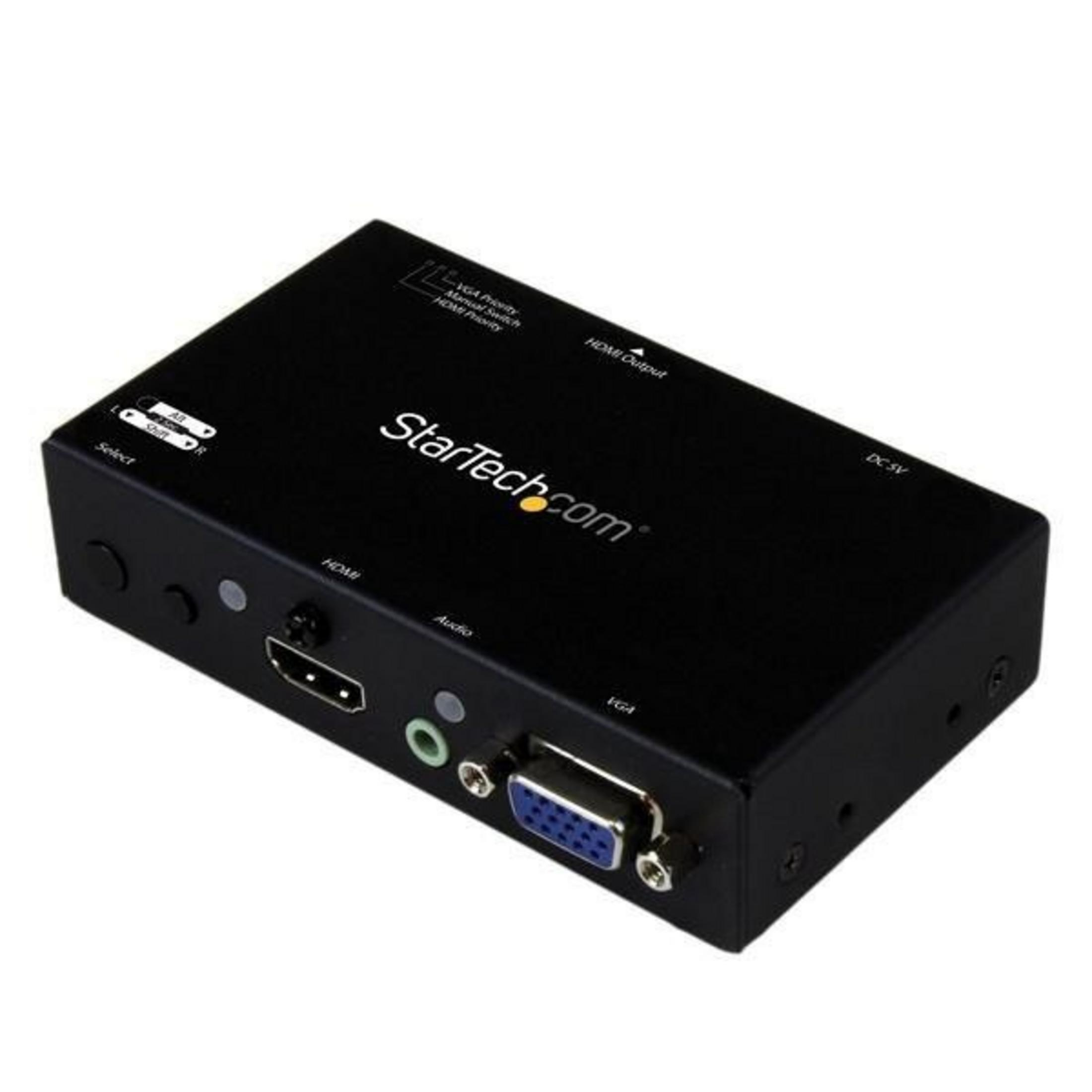 Conmutador StarTech.com negro con puertos HDMI, VGA y audio.