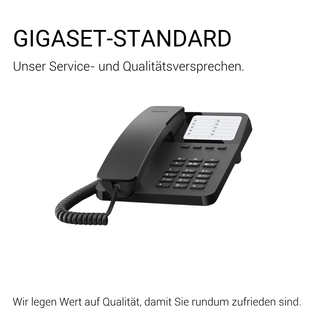 Ein schwarzes Gigaset-Telefon mit Schnur liegt auf einer weißen Fläche.