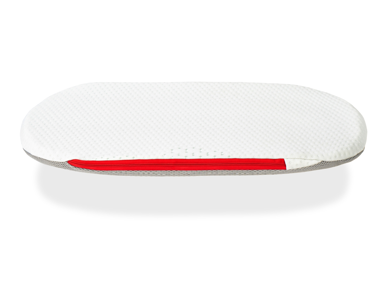 Una almohada blanca ovalada con cremallera roja y borde de malla gris.
