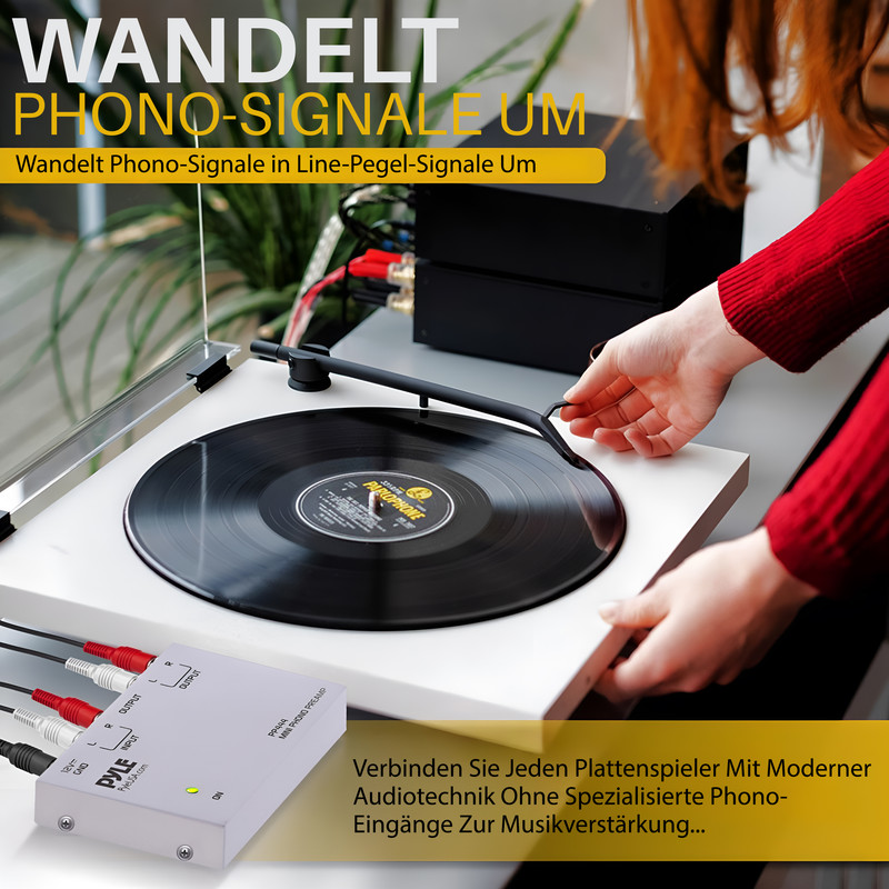 Ein Plattenspieler mit Vinyl-Schallplatte, verbunden mit einem Vorverstärker.