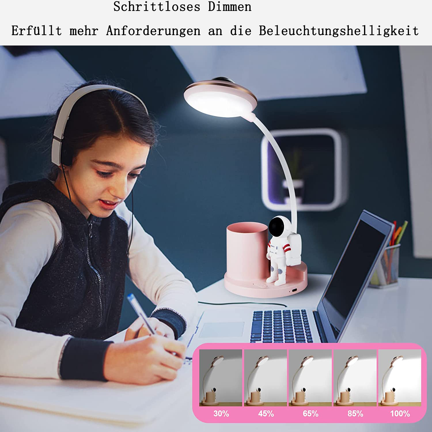 Mädchen mit Kopfhörern schreibt, Astronauten-Schreibtischlampe, Laptop.