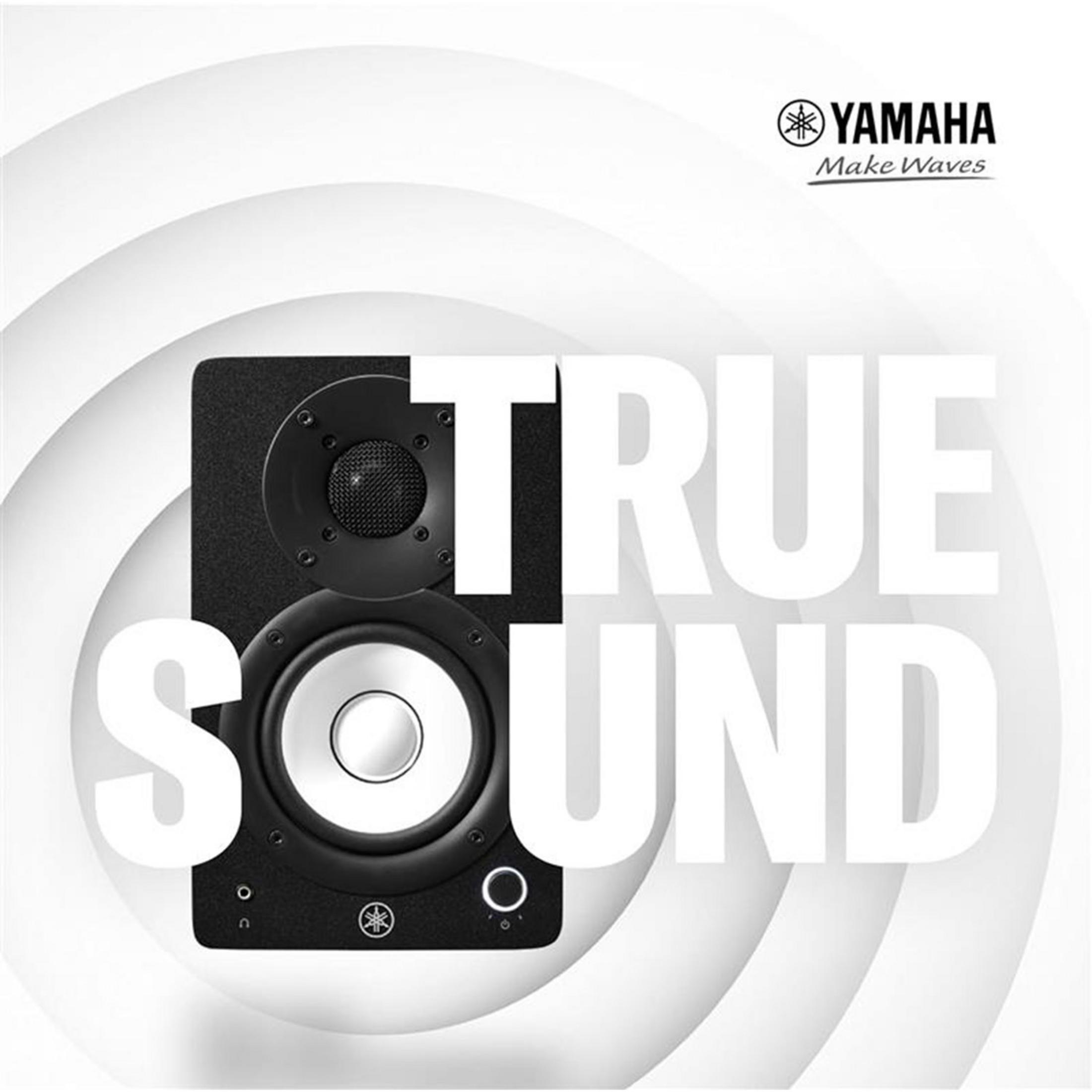 Głośnik Yamaha z napisem „TRUE SOUND”. Białe koncentryczne koła w tle.