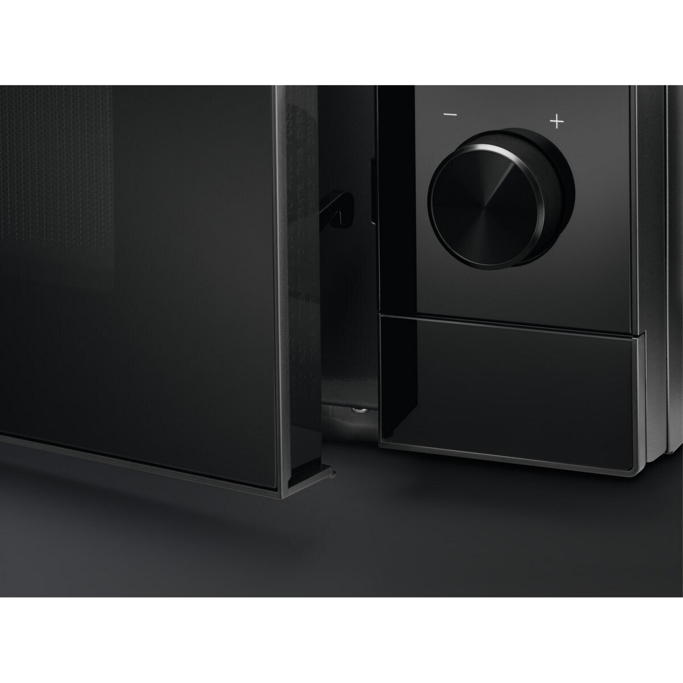 Horno negro con dial y botones de más/menos.