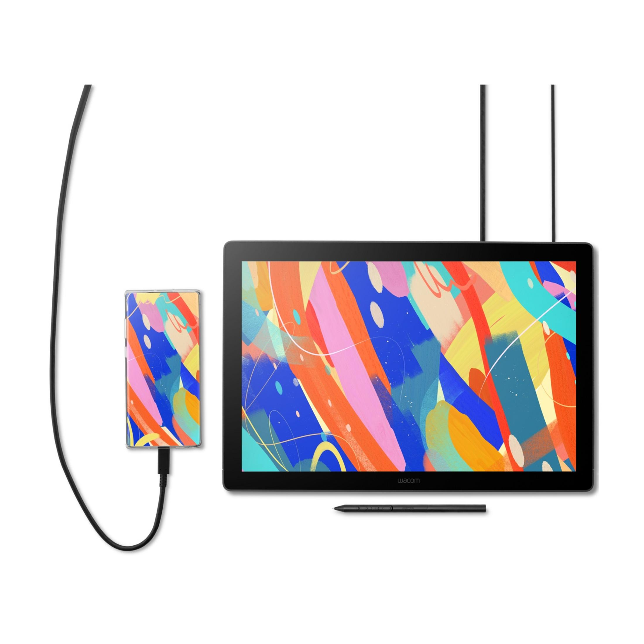 Ein Wacom-Zeichen-Tablet und Stift zeigen ein buntes abstraktes Design.