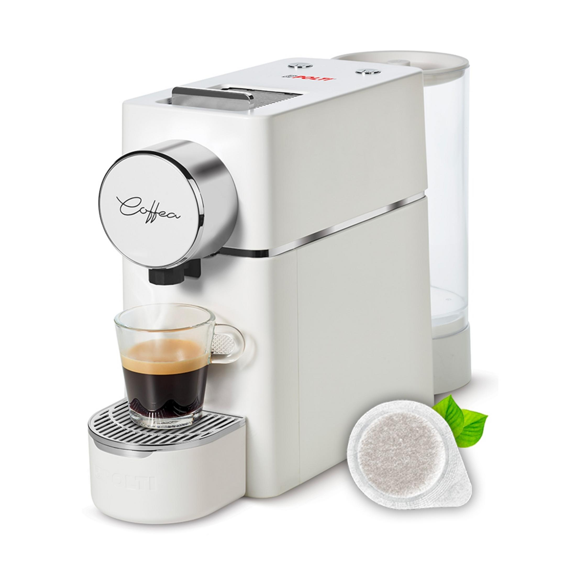 Una cafetera blanca con una taza de espresso y una cápsula de café.