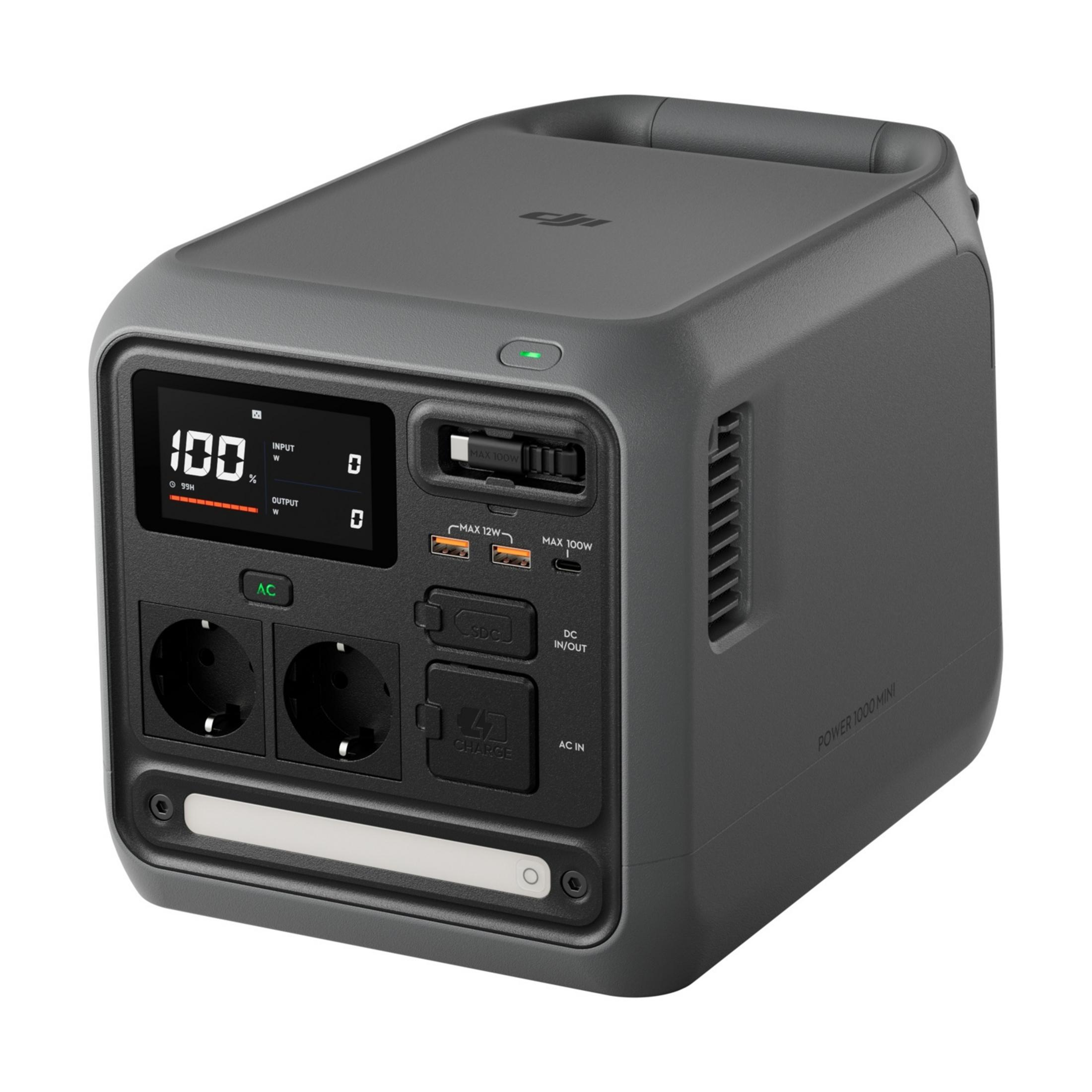Grauer Power-Akku mit digitaler Anzeige, Steckdosen und Anschlüssen.