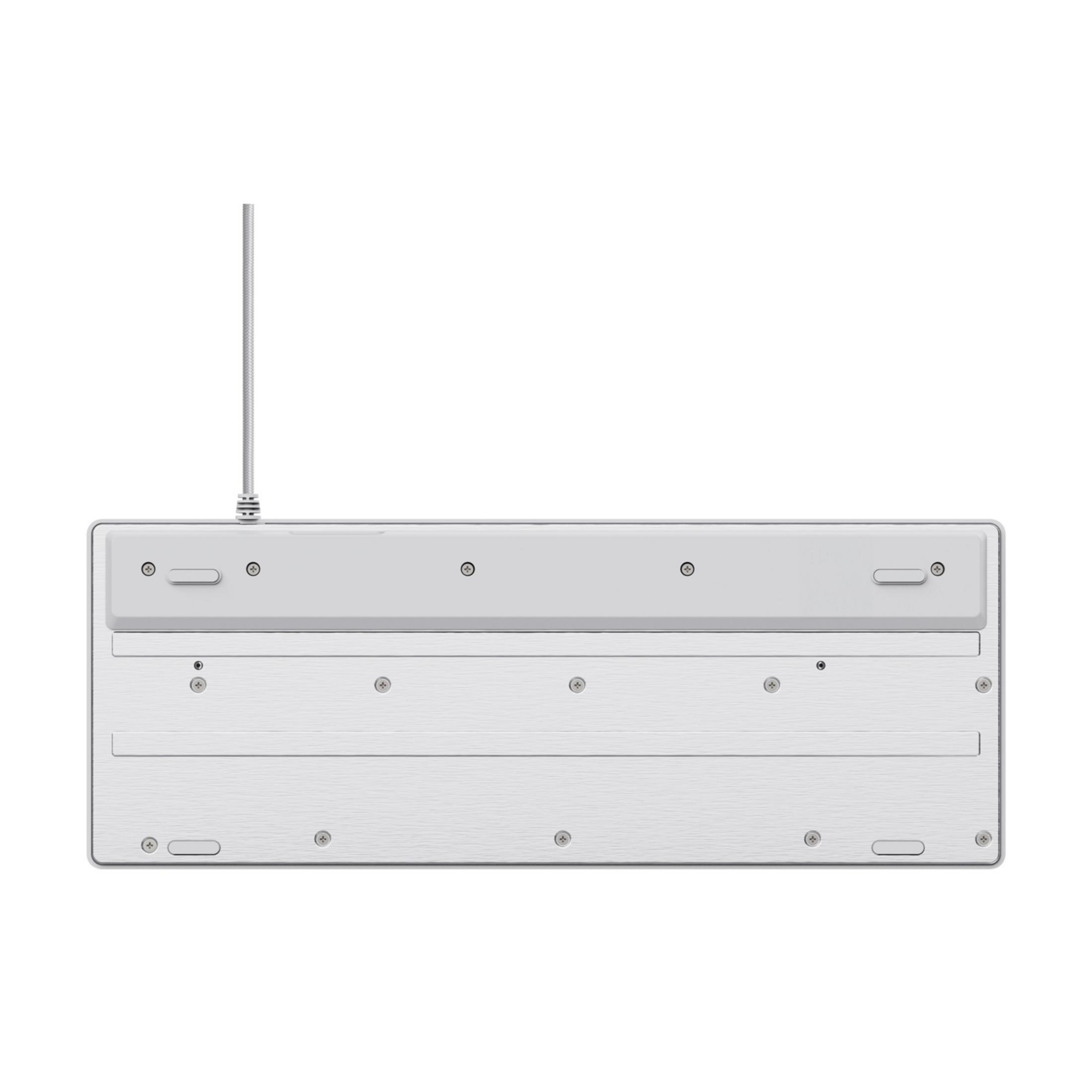Parte inferior de un teclado blanco con detalles plateados y una fina antena.