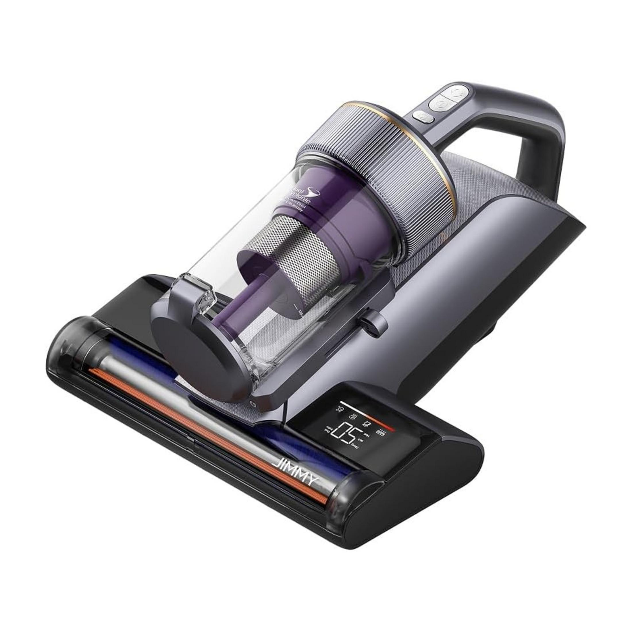 Ein dunkelgrauer Handstaubsauger mit violettem Staubbehälter und LED-Anzeige.