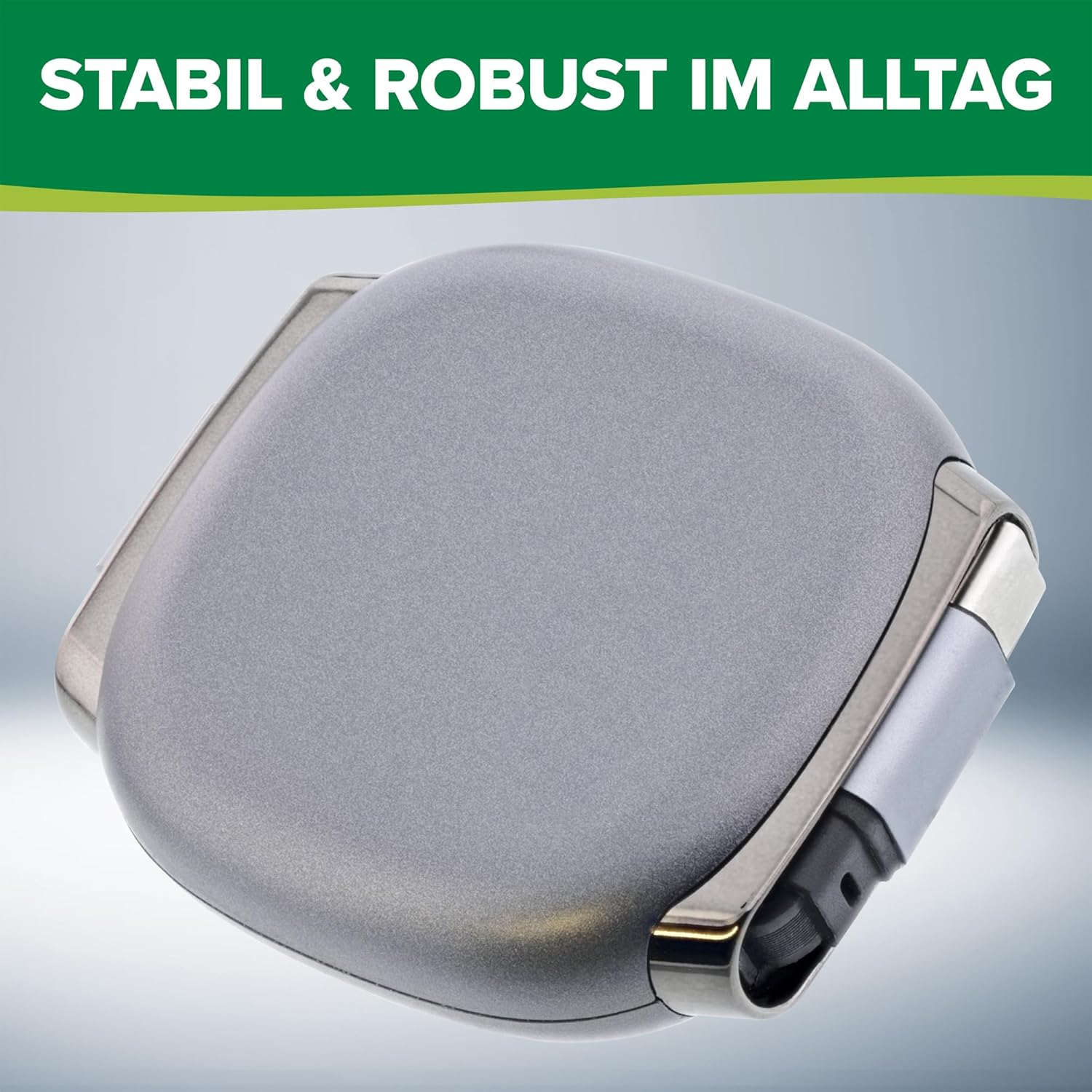 Grauer, kompakter Ladeadapter mit silbernen Akzenten und einem USB-C-Anschluss.