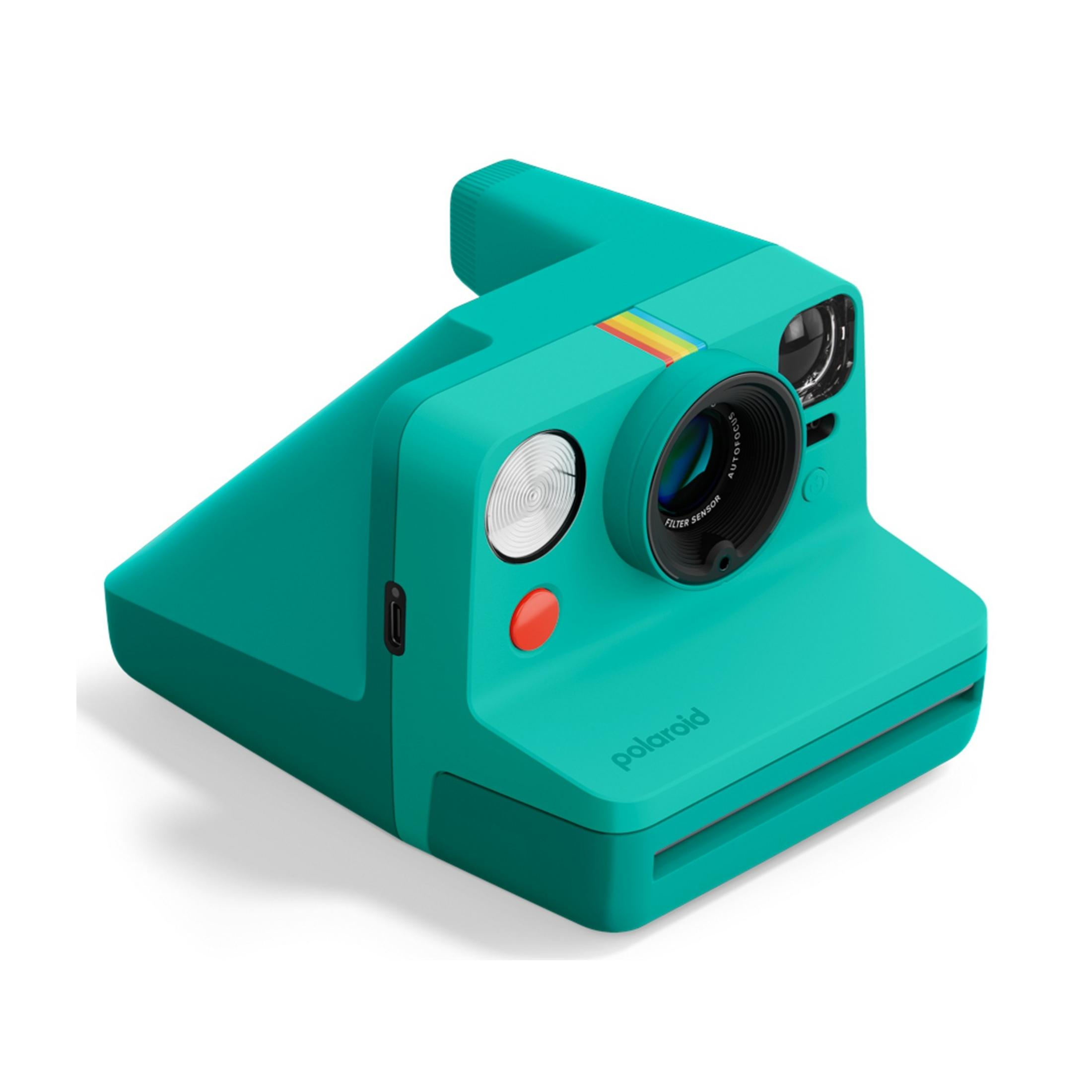 Eine türkisfarbene Polaroid-Sofortbildkamera mit einem Objektiv und Blitz.