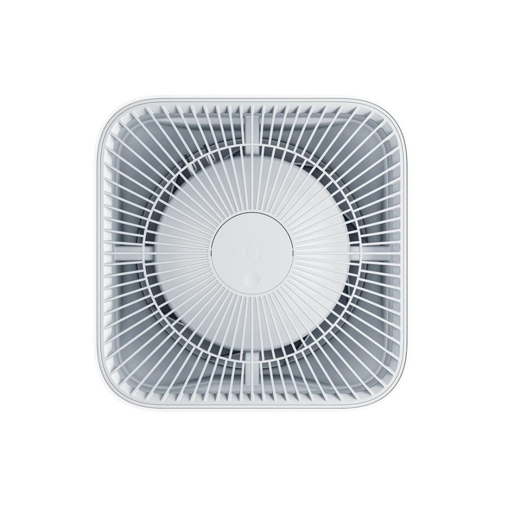 Un ventilatore bianco visto dall'alto con griglia rotonda.