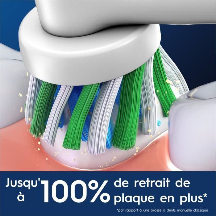 Uno spazzolino elettrico pulisce i denti con setole verdi, blu e bianche.