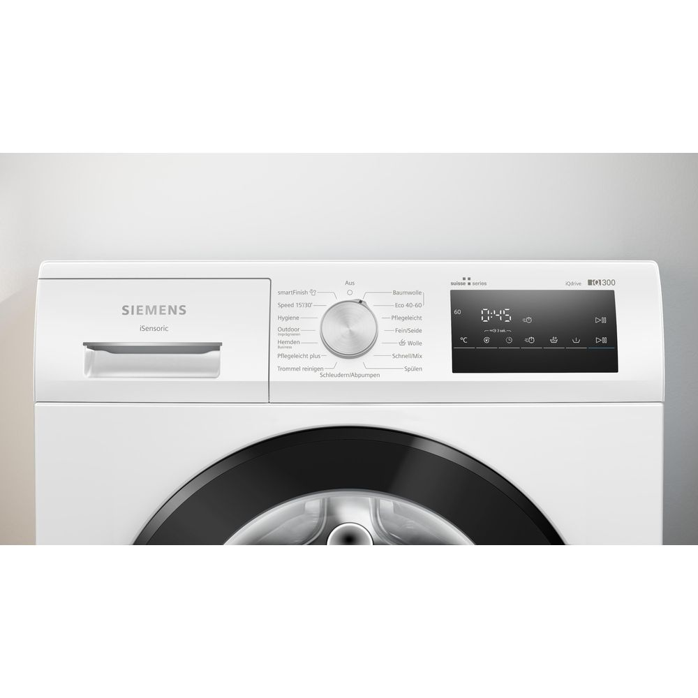Eine weiße Siemens Waschmaschine mit digitaler Anzeige und Drehknopf-Programmauswahl.