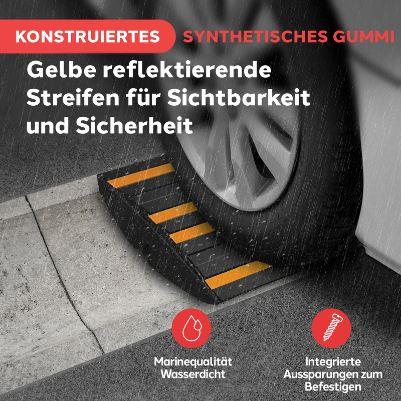 Schwarzer Rampenkeil aus Gummi mit gelben reflektierenden Streifen, daneben ein Autoreifen.