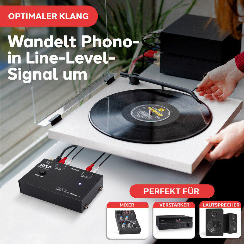 Plattenspieler mit Phono-Vorverstärker, verbunden mit einem Verstärker und Lautsprechern.