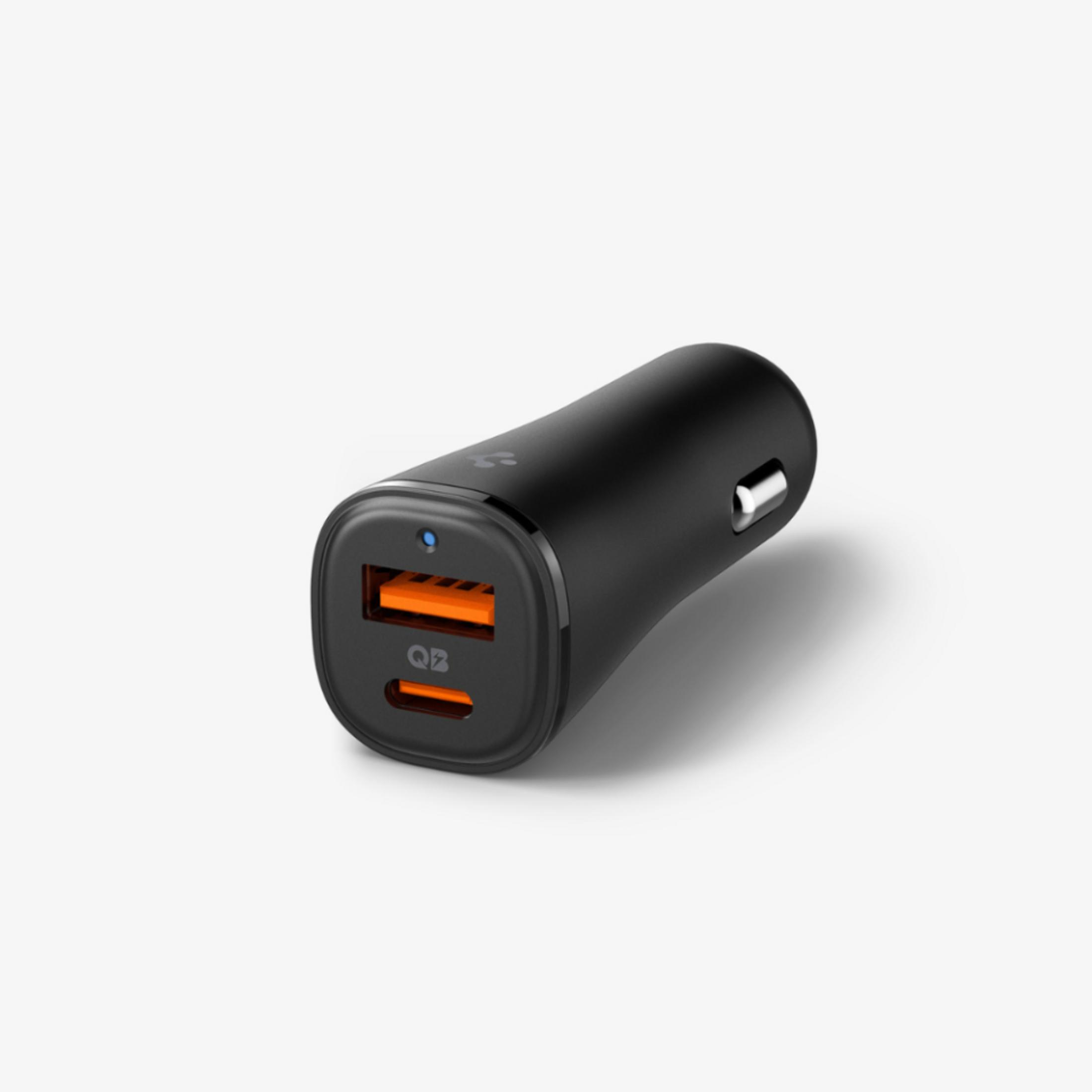 Black car charger with two orange USB ports and a blue LED indicator light.