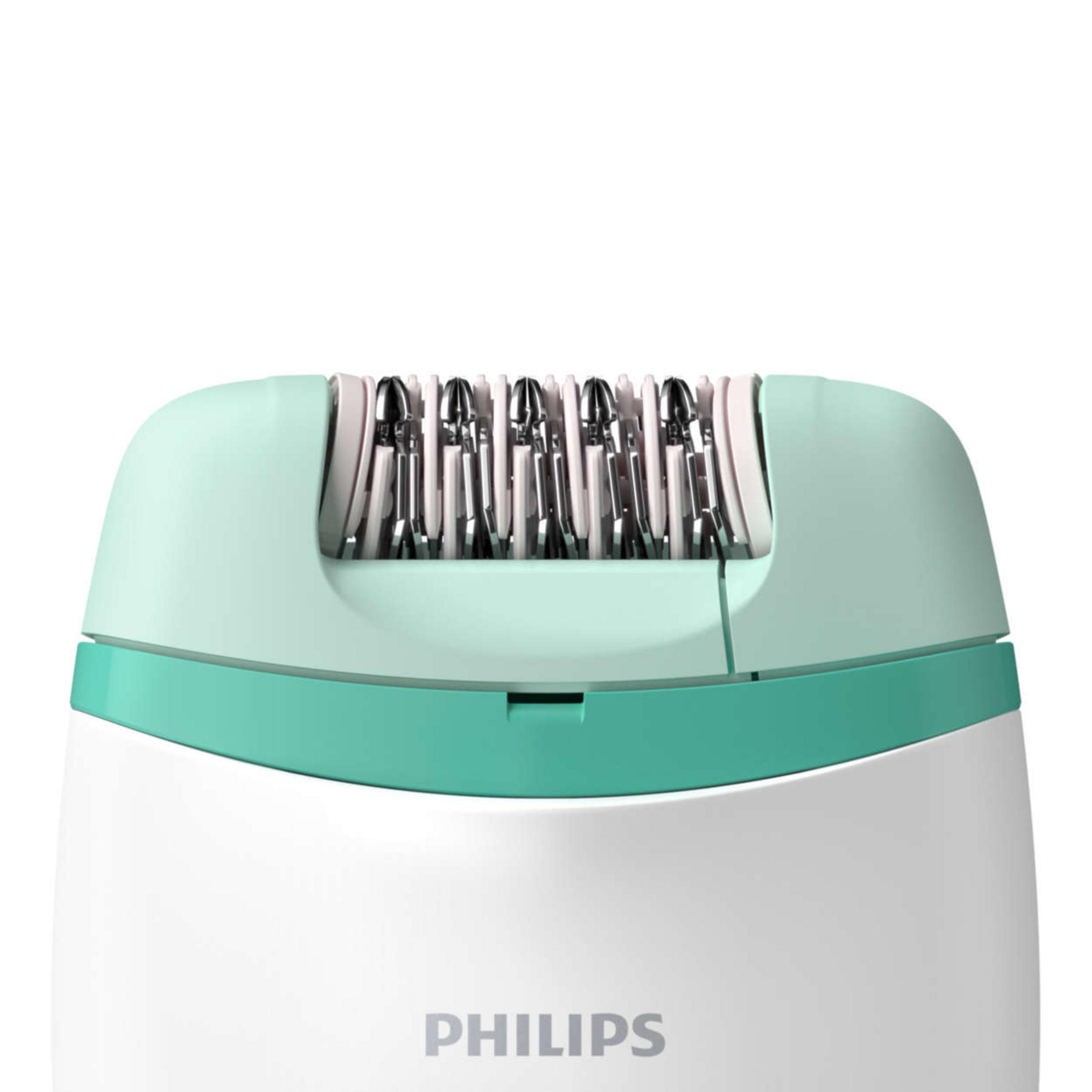 Beyaz ve turkuaz parçalı bir Philips epilatörünün yakın çekimi.