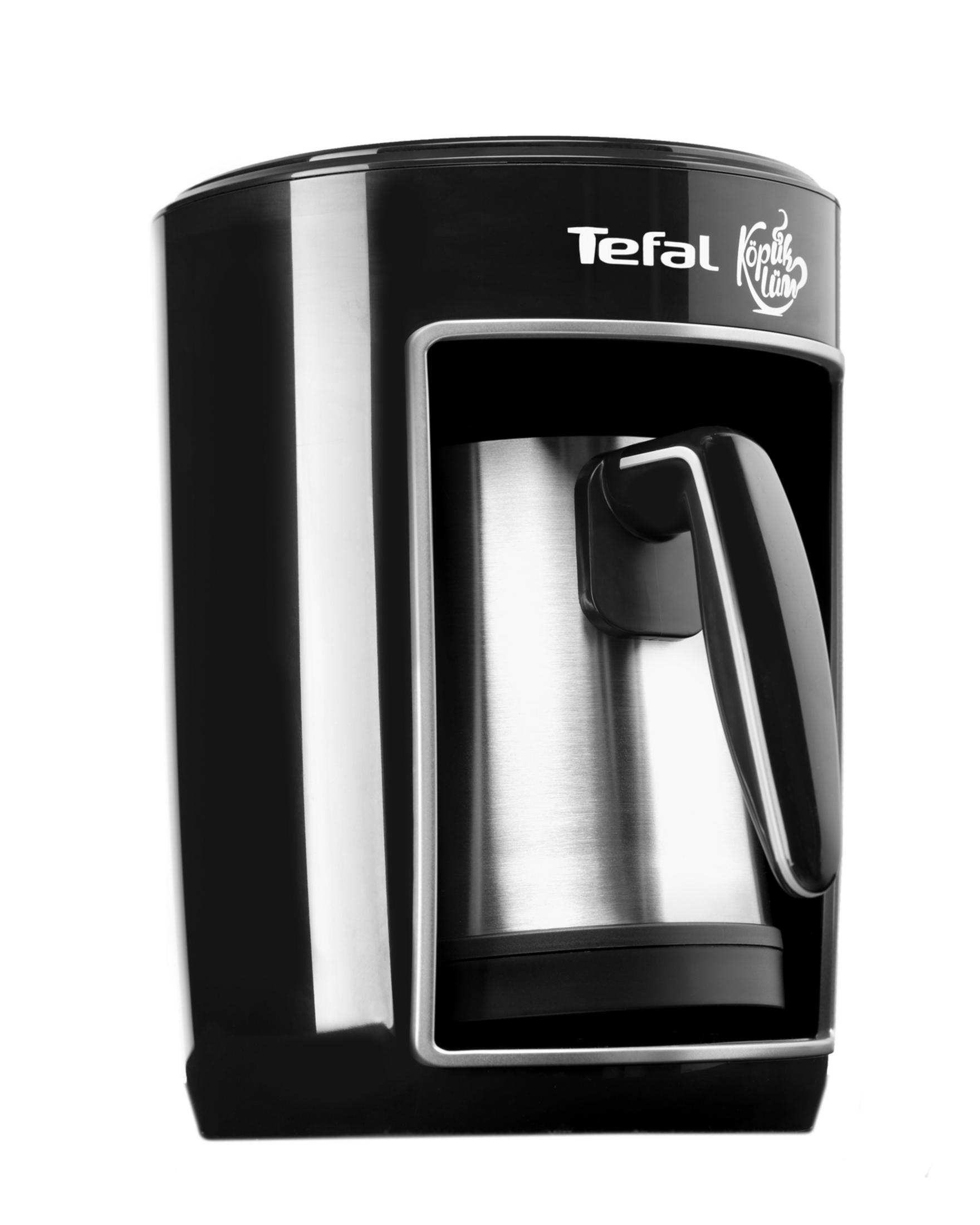 Gümüş tencere ve kulplu siyah Tefal kahve makinesi.
